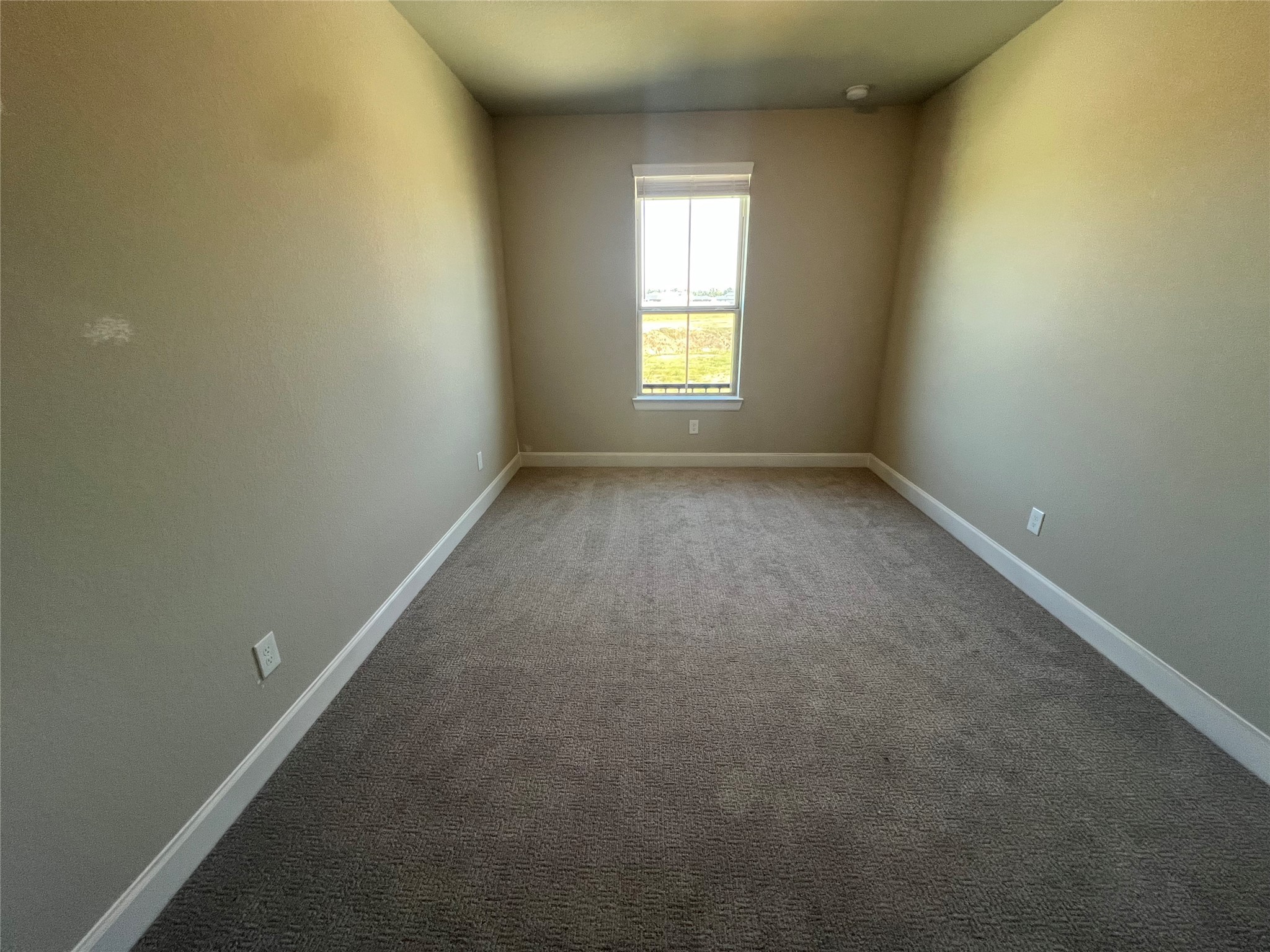 136 Peninsula Point Drive Montgomery, TX 77356 - Photo 13 of 36 an empty room with a window