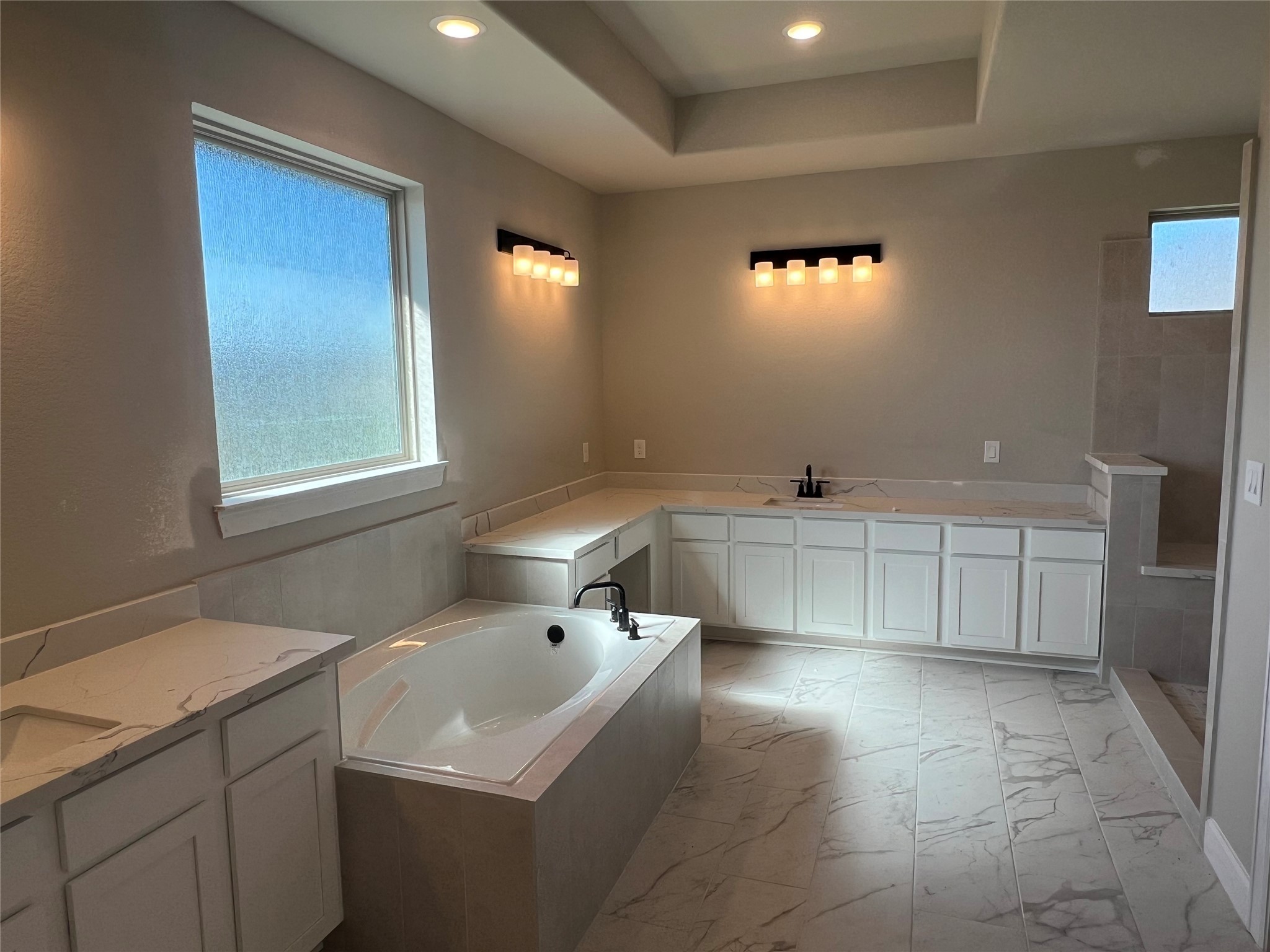 136 Peninsula Point Drive Montgomery, TX 77356 - Photo 8 of 36 a bathroom with a sink and a vanity