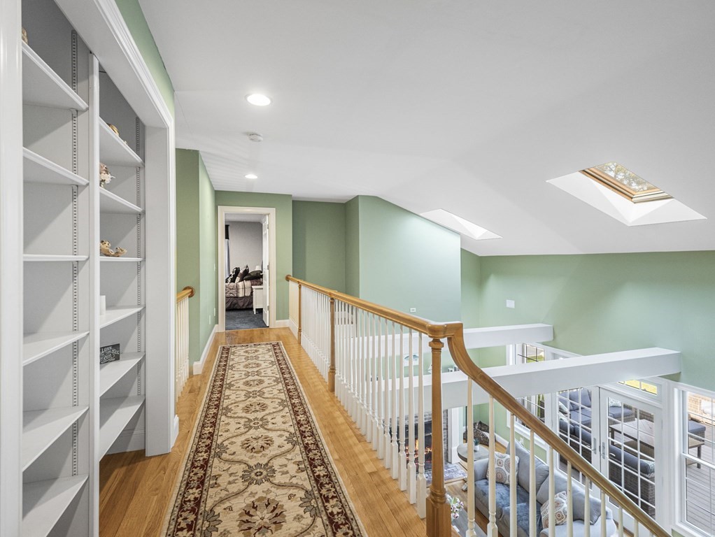 90 Howes Path Dennis, MA 02638 - Photo 21 of 42 a view of a hallway with wooden floor and stairs