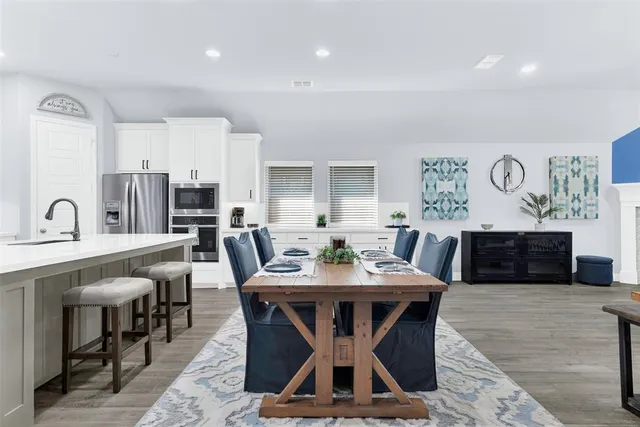 a view of a dining room with furniture