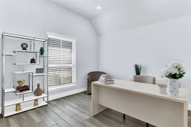 a living room with furniture and decor