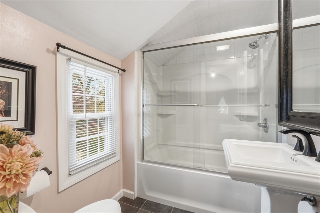 32 Pennsylvania Avenue Springfield, MA 01118 - Photo 20 of 41 a bathroom with a bathtub and a shower