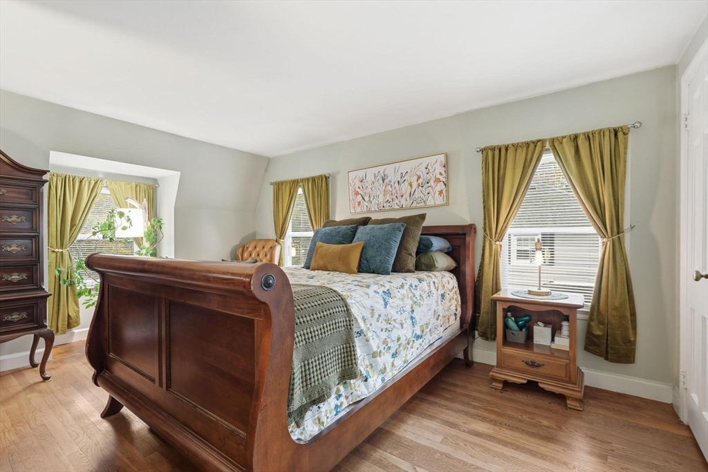 32 Pennsylvania Avenue Springfield, MA 01118 - Photo 21 of 41 a bed room with a bed and a tv