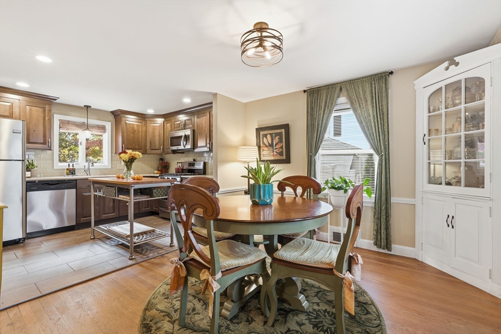 32 Pennsylvania Avenue Springfield, MA 01118 - Photo 3 of 41 a dining room with furniture a window and wooden floor