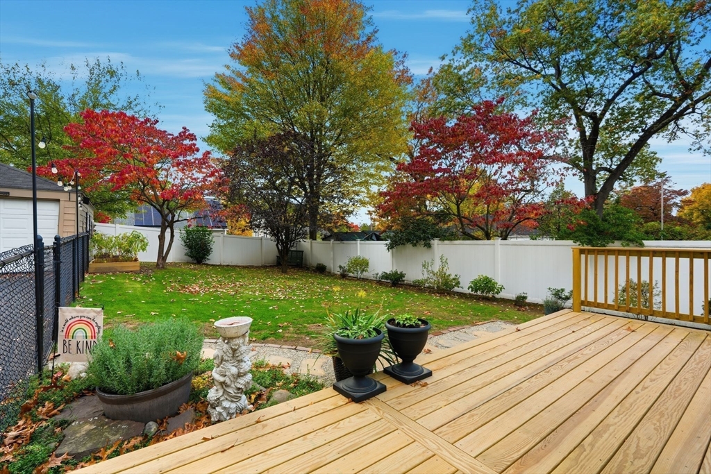 32 Pennsylvania Avenue Springfield, MA 01118 - Photo 31 of 41 a view of a backyard with wooden fence