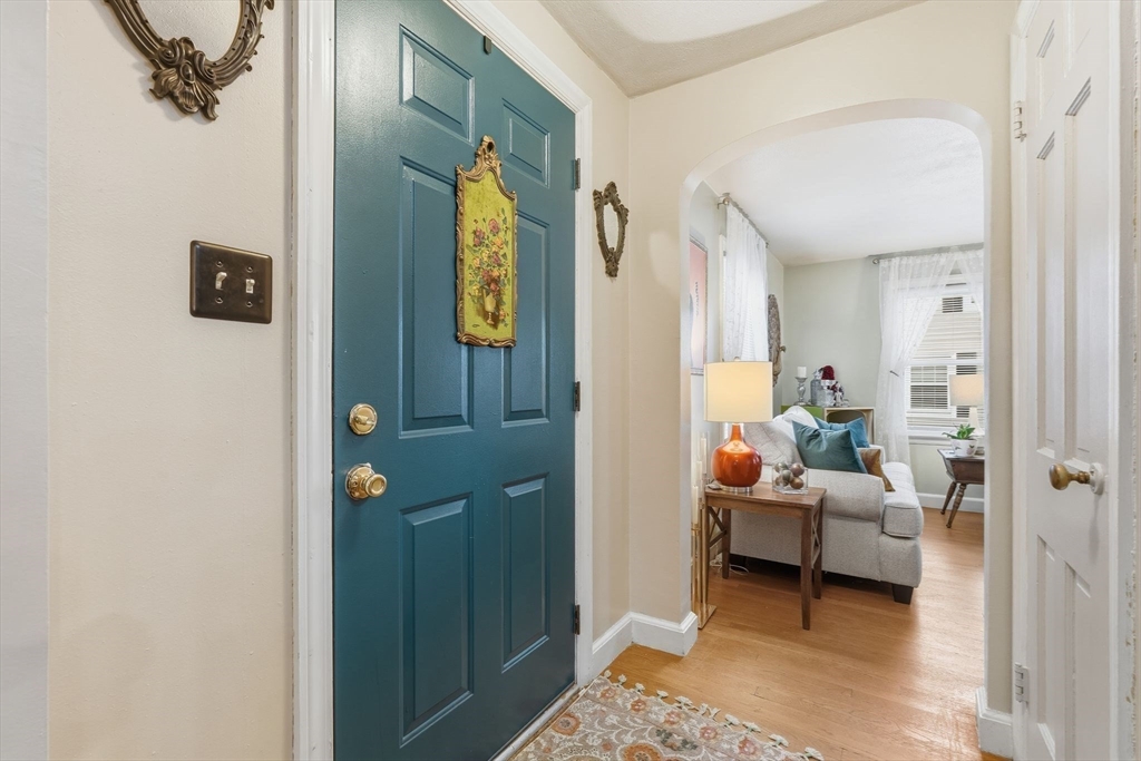 32 Pennsylvania Avenue Springfield, MA 01118 - Photo 8 of 41 a living room with furniture and a table