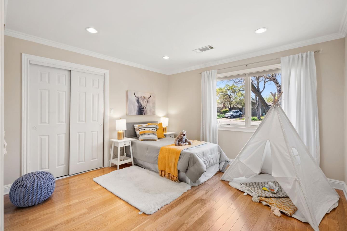1030 Ashley Place Mountain View, CA 94040 - Photo 24 of 32 a bedroom with a bed and wooden floor