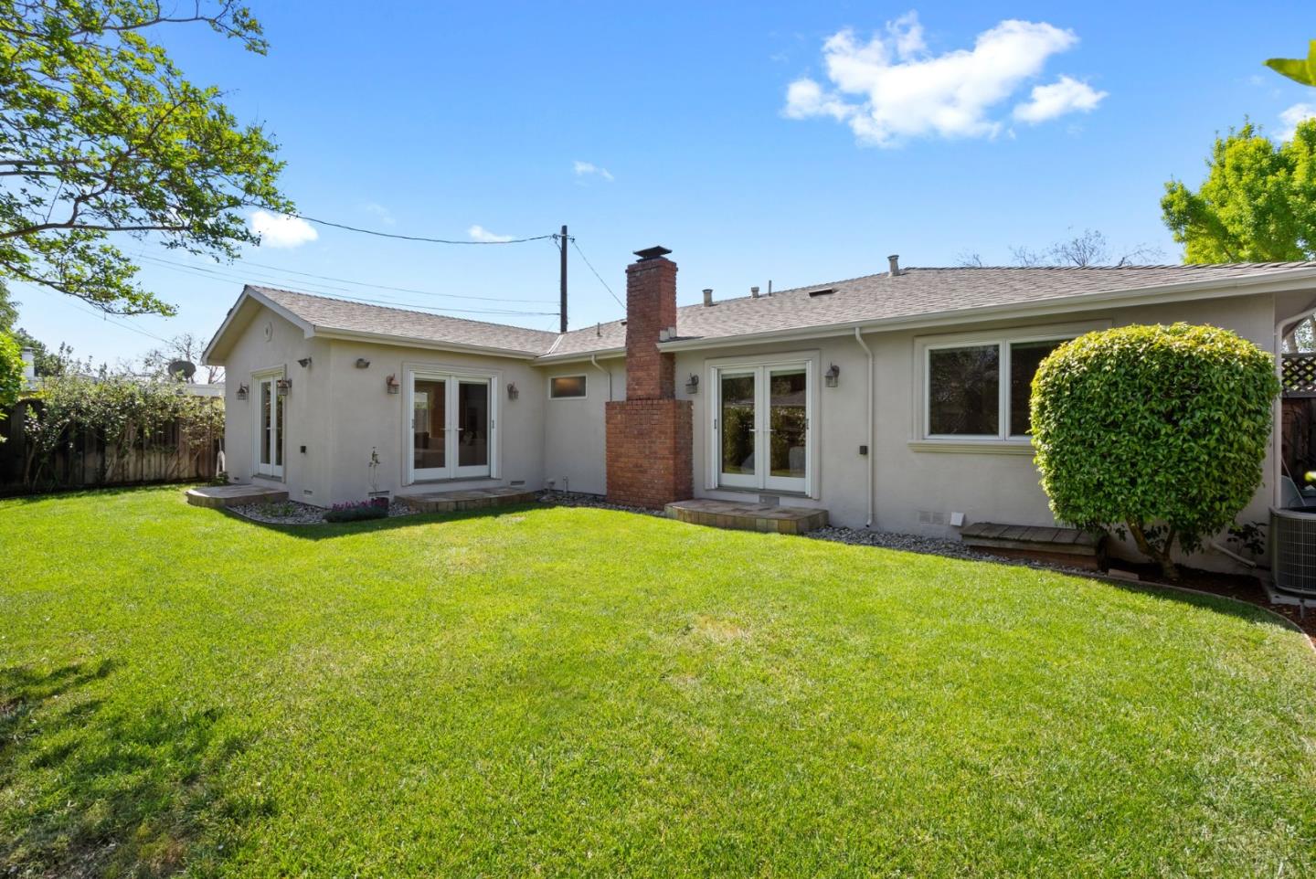 1030 Ashley Place Mountain View, CA 94040 - Photo 29 of 32 a view of a house with backyard and garden