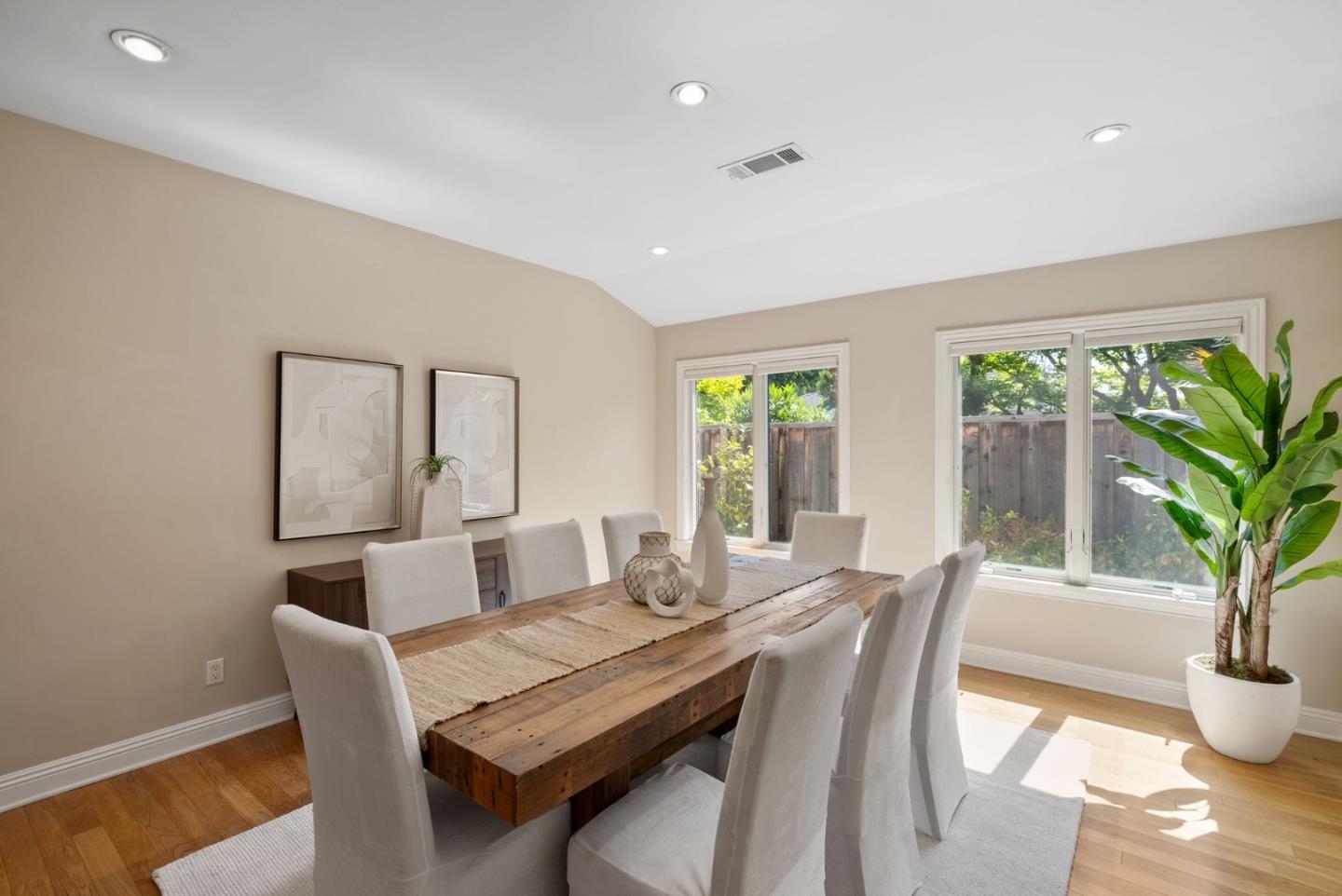 1030 Ashley Place Mountain View, CA 94040 - Photo 6 of 32 a dining room with furniture potted plants and wooden floor