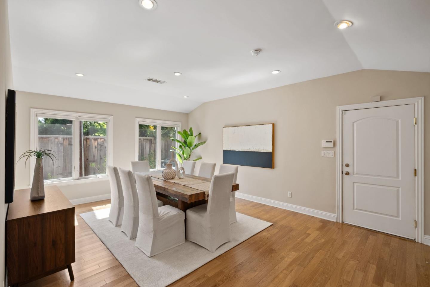 1030 Ashley Place Mountain View, CA 94040 - Photo 8 of 32 a dining room with furniture and wooden floor