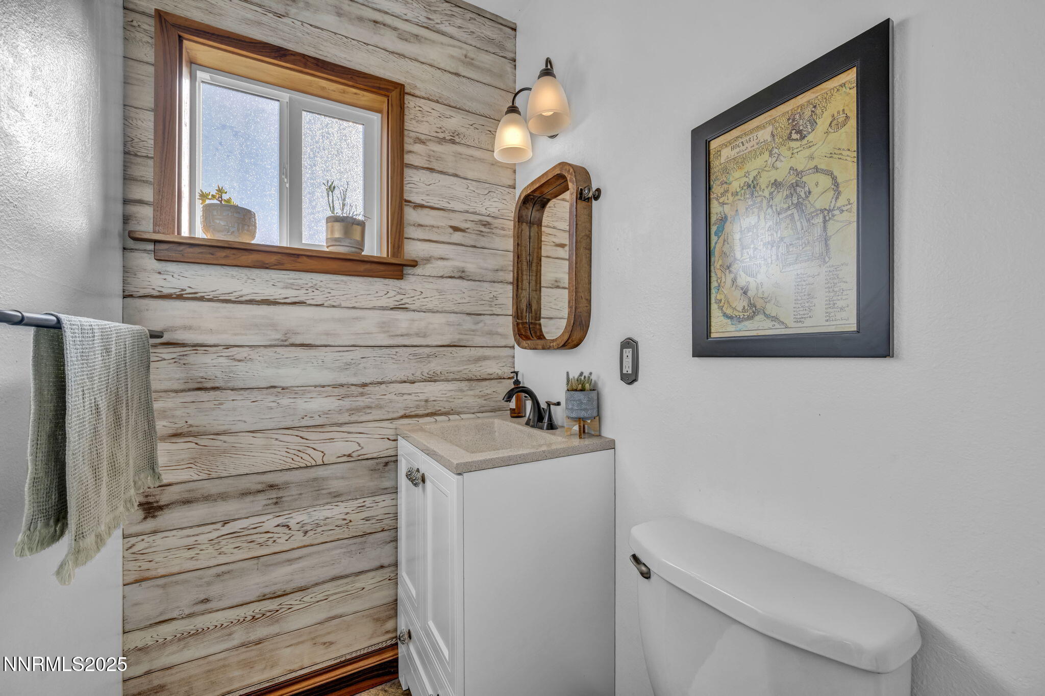 1100 Mission Circle Reno, NV 89503 - Photo 23 of 61 a bathroom with a sink and a mirror