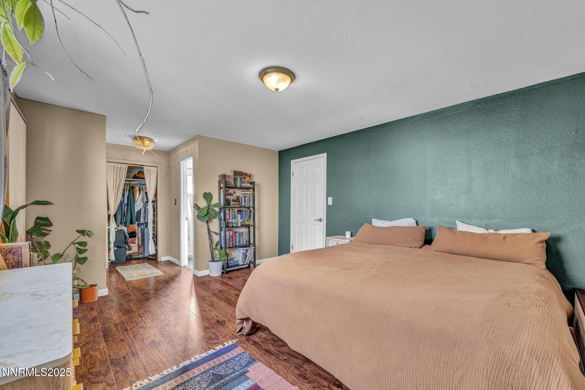 1100 Mission Circle Reno, NV 89503 - Photo 28 of 61 a bedroom with a large bed and a large window
