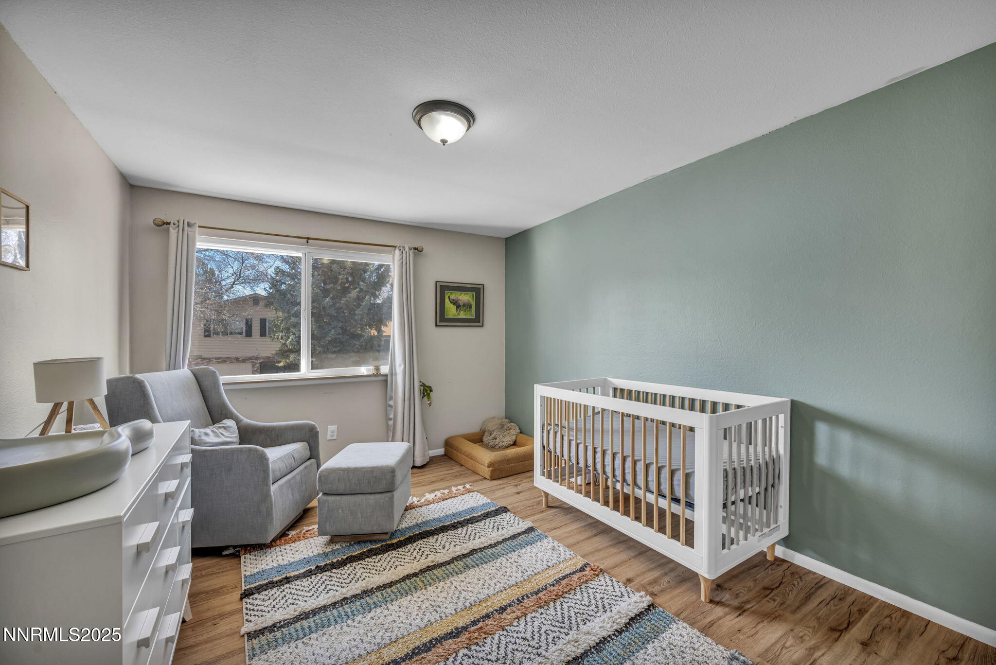 1100 Mission Circle Reno, NV 89503 - Photo 35 of 61 a living room with furniture and a window