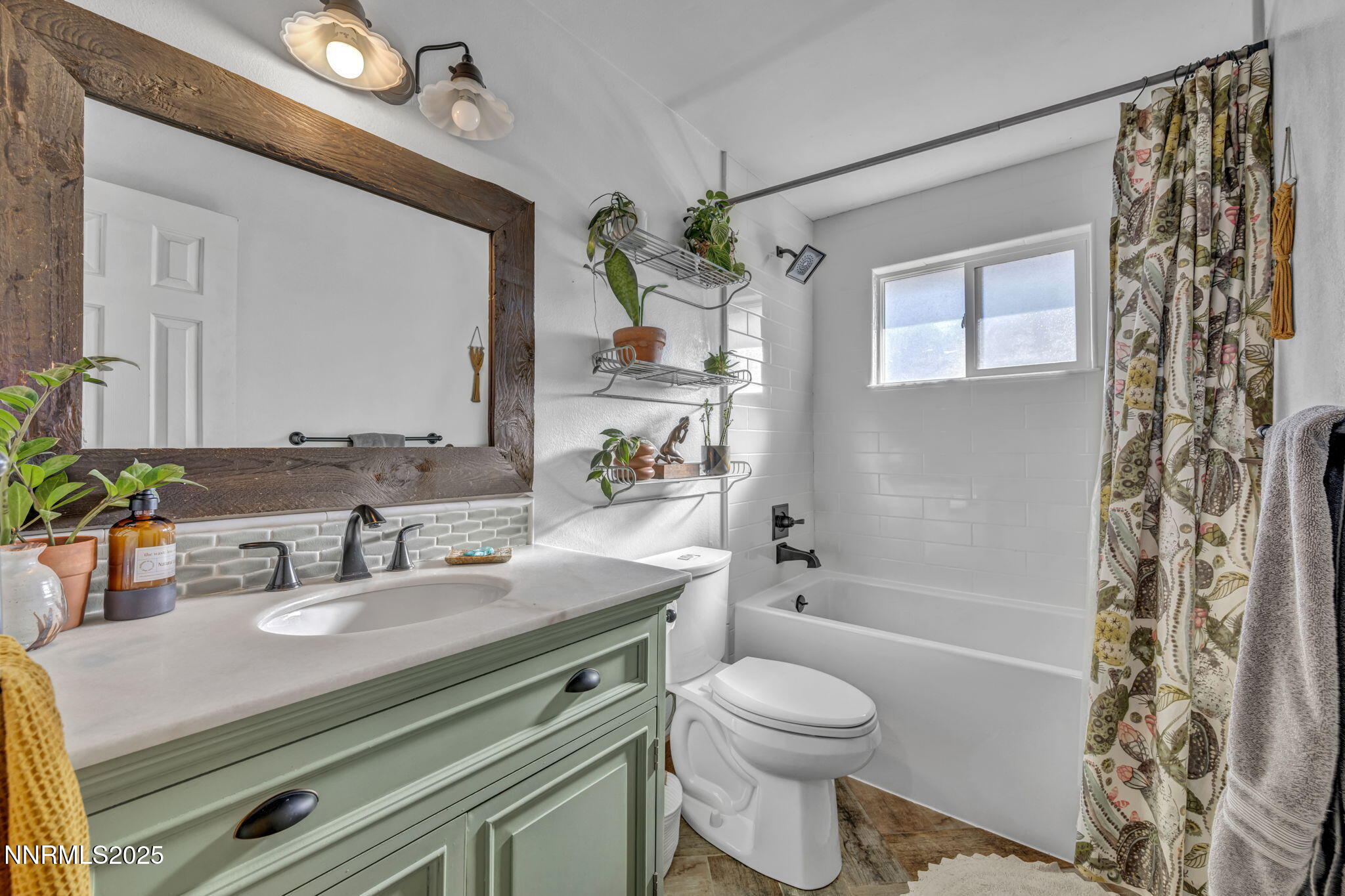 1100 Mission Circle Reno, NV 89503 - Photo 36 of 61 a bathroom with a sink toilet a mirror and shower