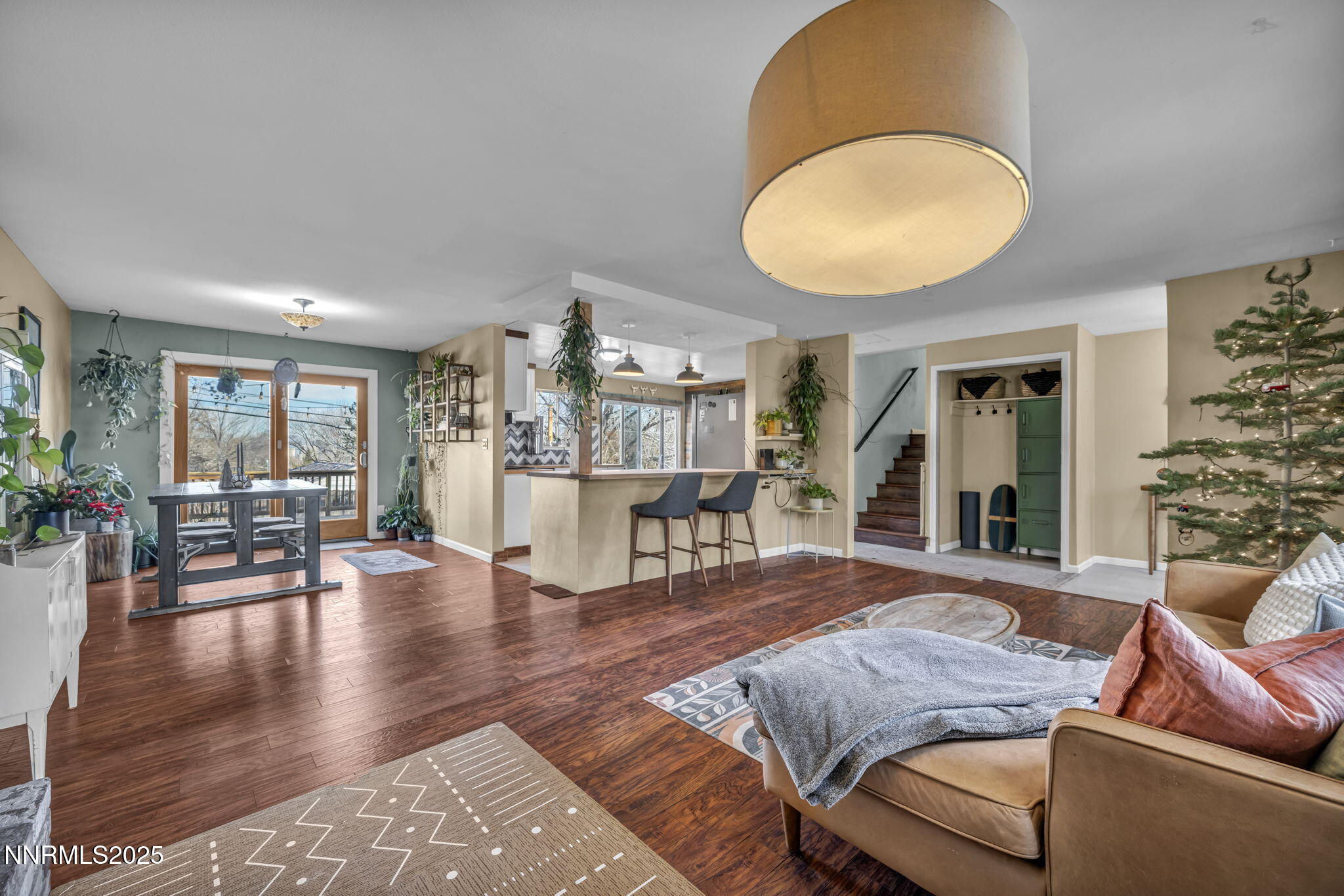 1100 Mission Circle Reno, NV 89503 - Photo 7 of 61 a living room with furniture and wooden floor