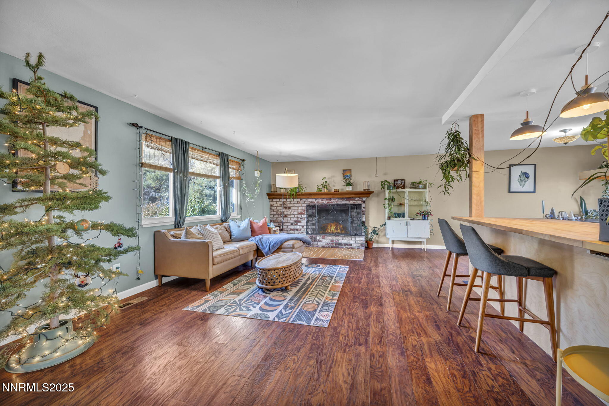 1100 Mission Circle Reno, NV 89503 - Photo 8 of 61 a living room with furniture and a fireplace