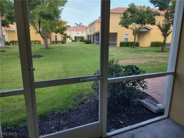 a view of a back yard from a window
