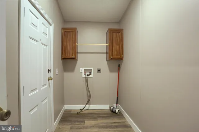 a view of entryway with wooden floor
