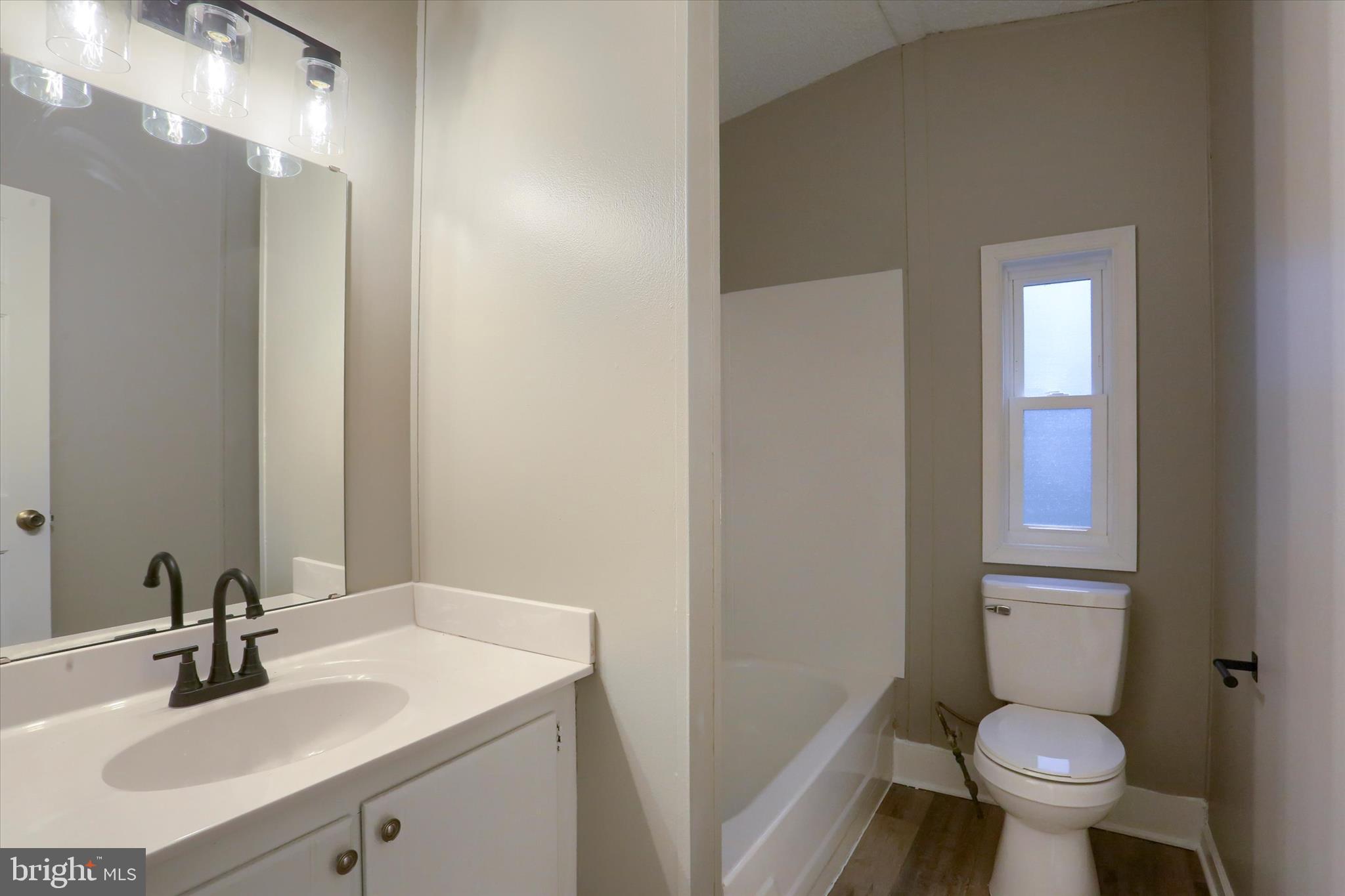 1311 Woodbine Road Airville, PA 17302 - Photo 21 of 29 a bathroom with a sink toilet and a mirror