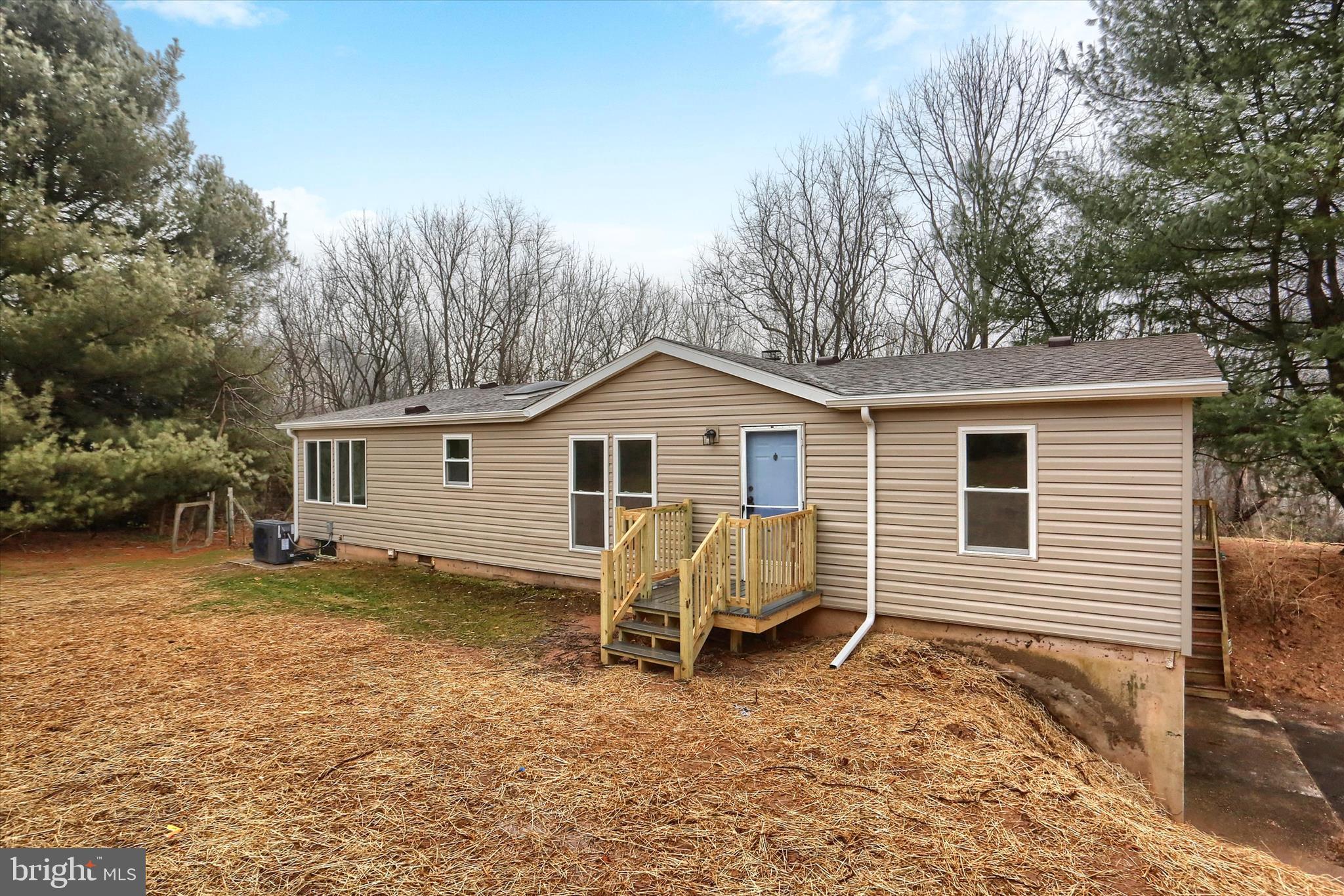 1311 Woodbine Road Airville, PA 17302 - Photo 4 of 29 a view of a house with a yard