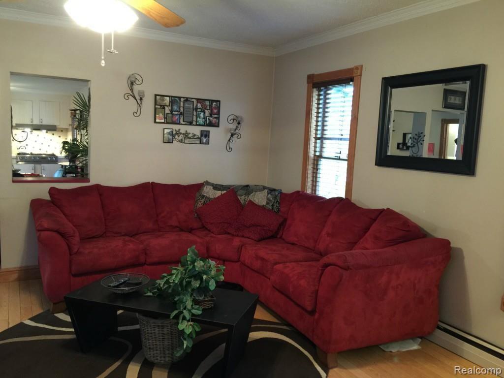 2659 Byron Road Howell, MI 48855 - Photo 15 of 45 Living room with pass through window into dining area