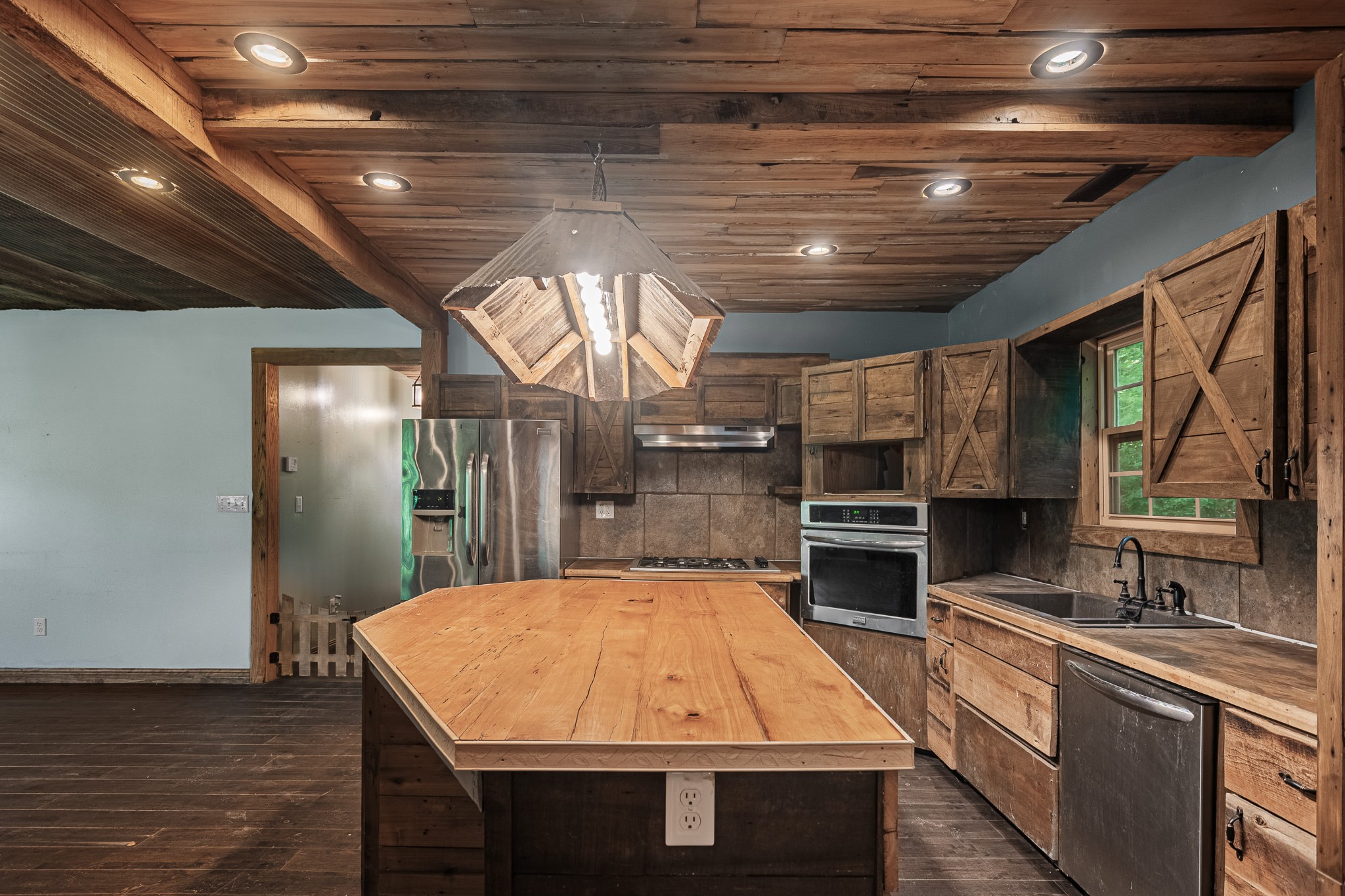 3671 Raleigh Beard Road Santa Fe, TN 38482 - Photo 12 of 32 a kitchen with a stove and a sink