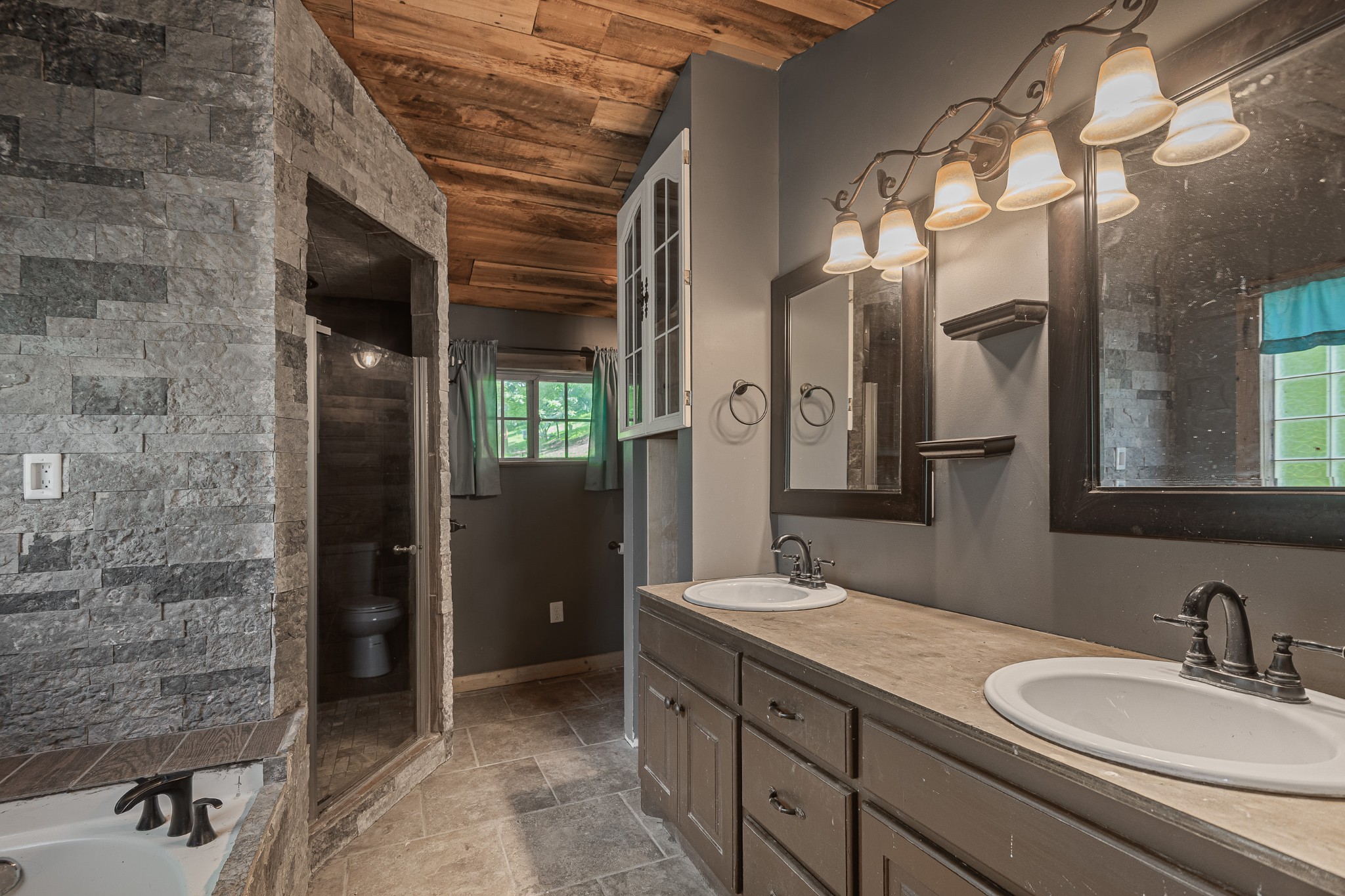 3671 Raleigh Beard Road Santa Fe, TN 38482 - Photo 16 of 32 a bathroom with a granite countertop sink a mirror and a shower