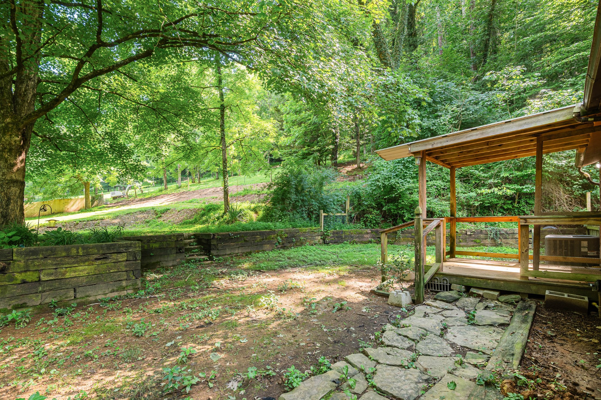3671 Raleigh Beard Road Santa Fe, TN 38482 - Photo 29 of 32 a backyard of a house with table and chairs