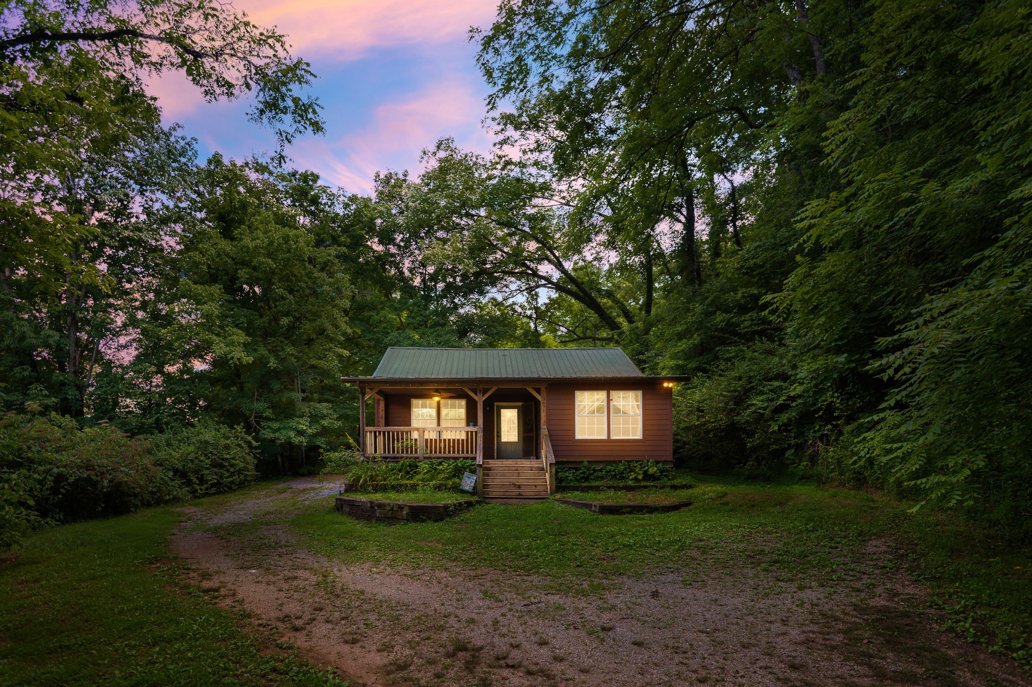 3671 Raleigh Beard Road Santa Fe, TN 38482 - Photo 5 of 32 a front view of a house with yard and green space