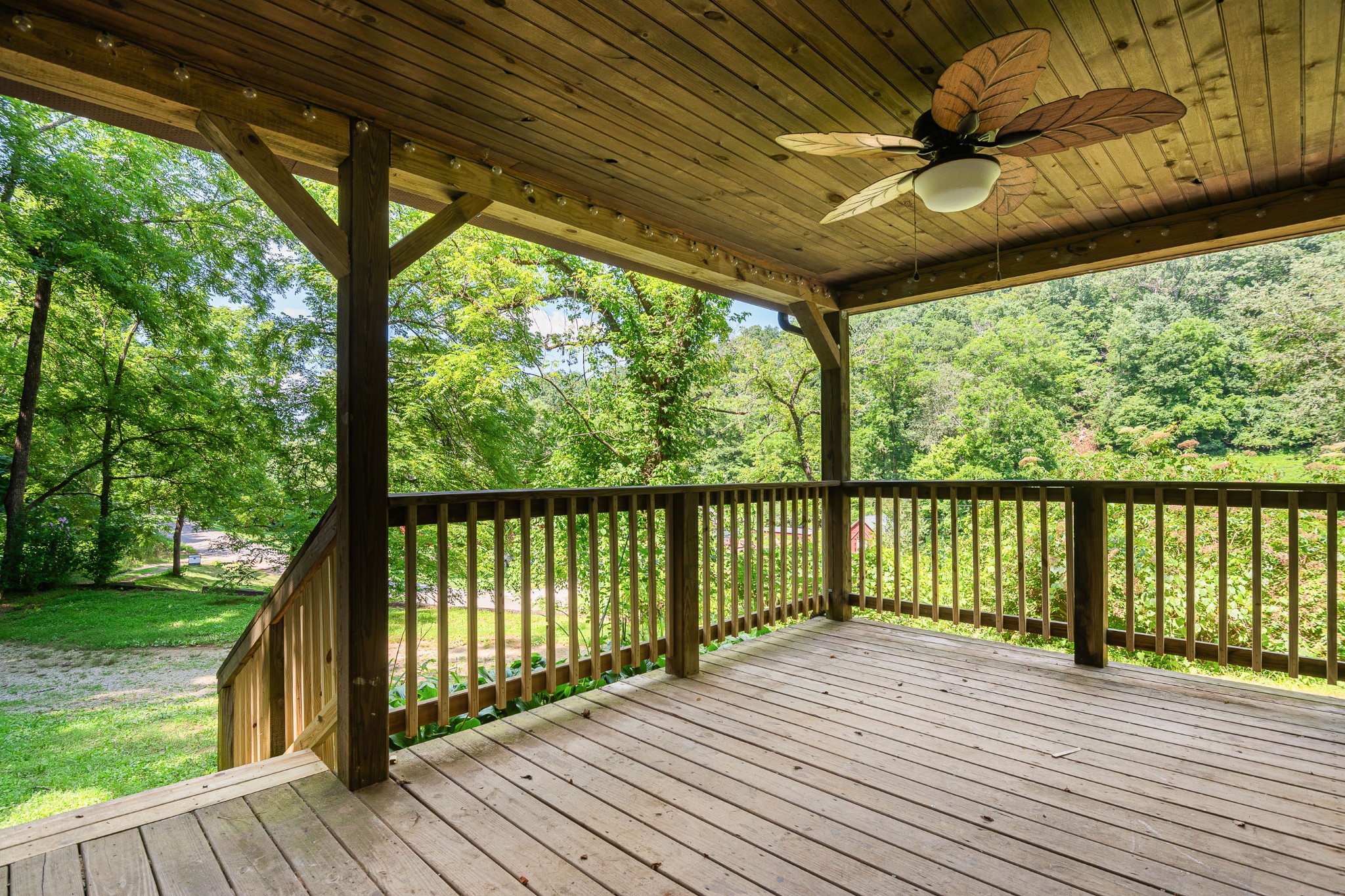 3671 Raleigh Beard Road Santa Fe, TN 38482 - Photo 6 of 32 a view of a balcony with wooden floor