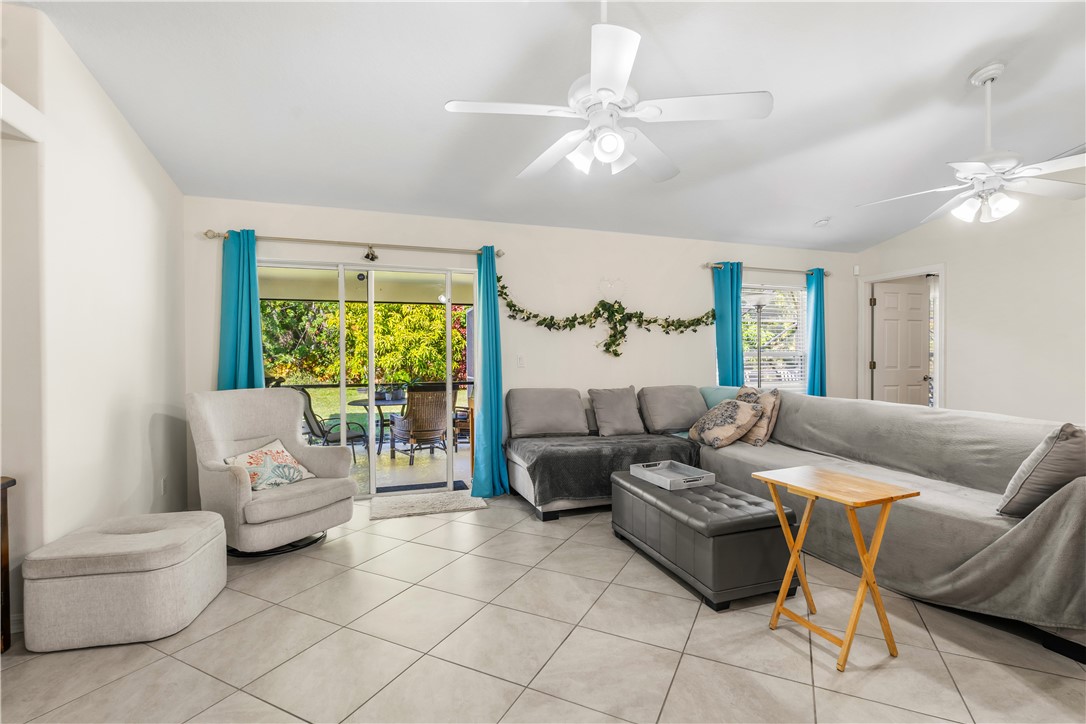 3660 2nd Street Southwest Vero Beach, FL 32968 - Photo 18 of 36 a living room with furniture and a large window
