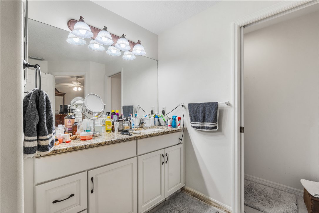 3660 2nd Street Southwest Vero Beach, FL 32968 - Photo 26 of 36 a bathroom with a sink a vanity and mirror