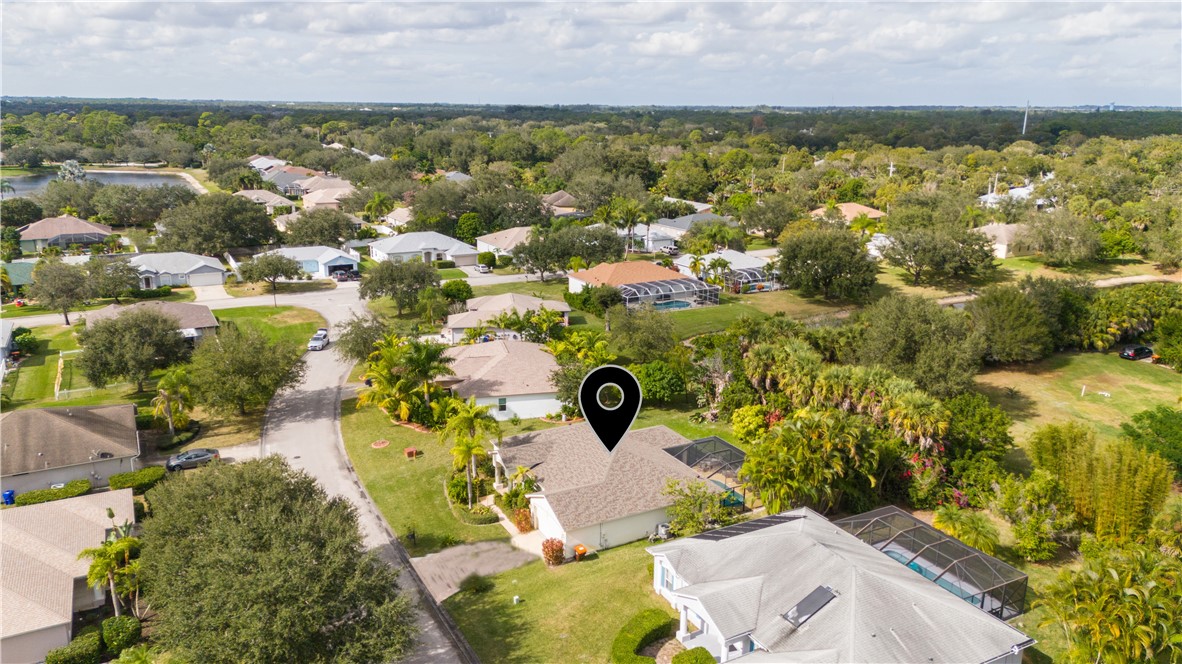 3660 2nd Street Southwest Vero Beach, FL 32968 - Photo 33 of 36 an aerial view of residential houses with outdoor space