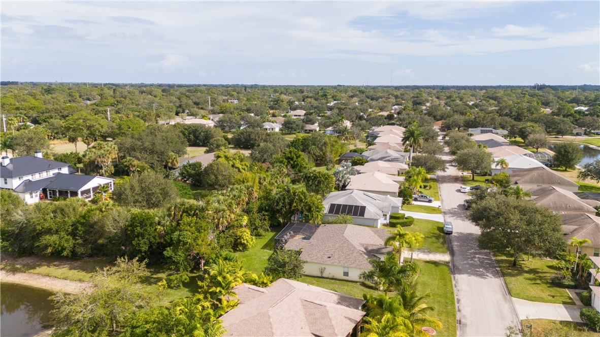3660 2nd Street Southwest Vero Beach, FL 32968 - Photo 34 of 36 an aerial view of residential houses with outdoor space