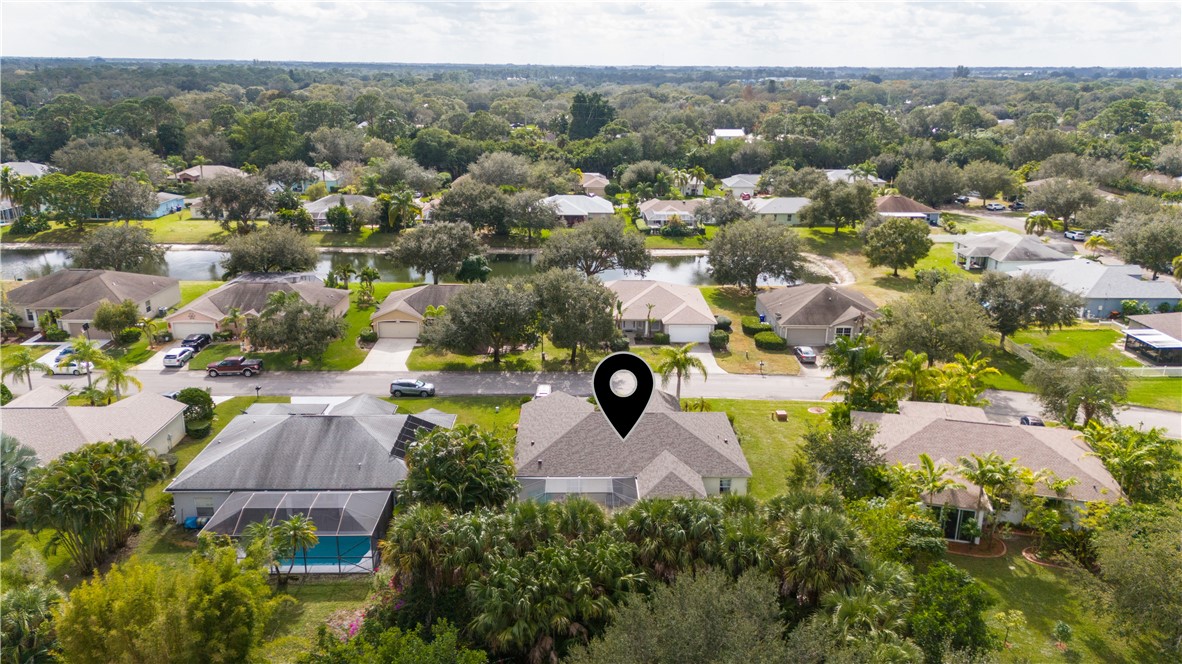 3660 2nd Street Southwest Vero Beach, FL 32968 - Photo 36 of 36 an aerial view of a house with a garden