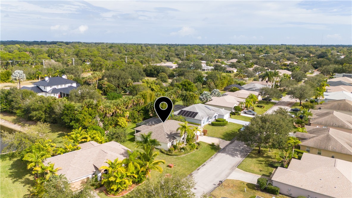 3660 2nd Street Southwest Vero Beach, FL 32968 - Photo 5 of 36 an aerial view of residential houses with outdoor space
