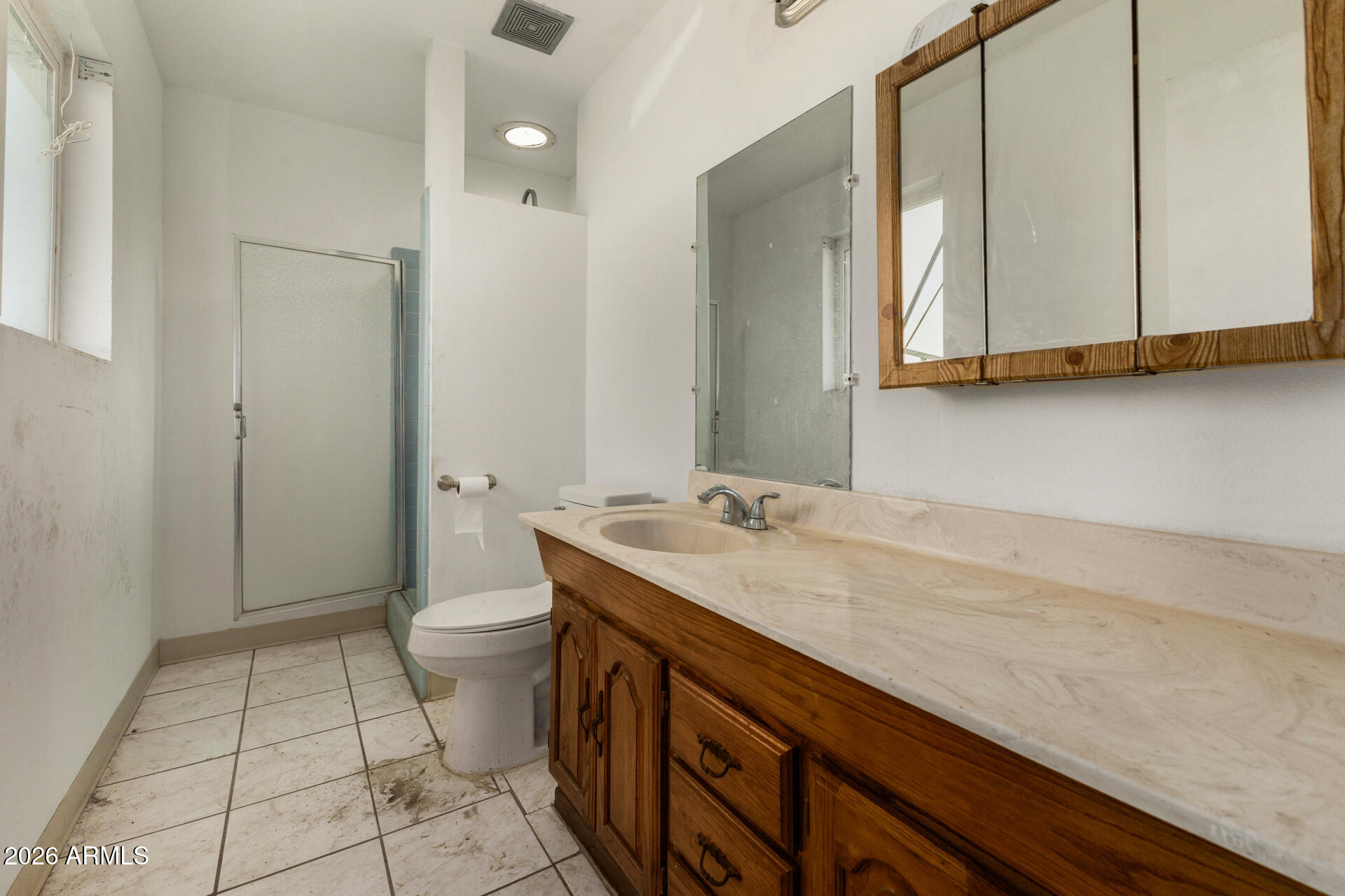 463 South Daley Mesa, AZ 85204 - Photo 12 of 28 a bathroom with a sink a toilet and a mirror