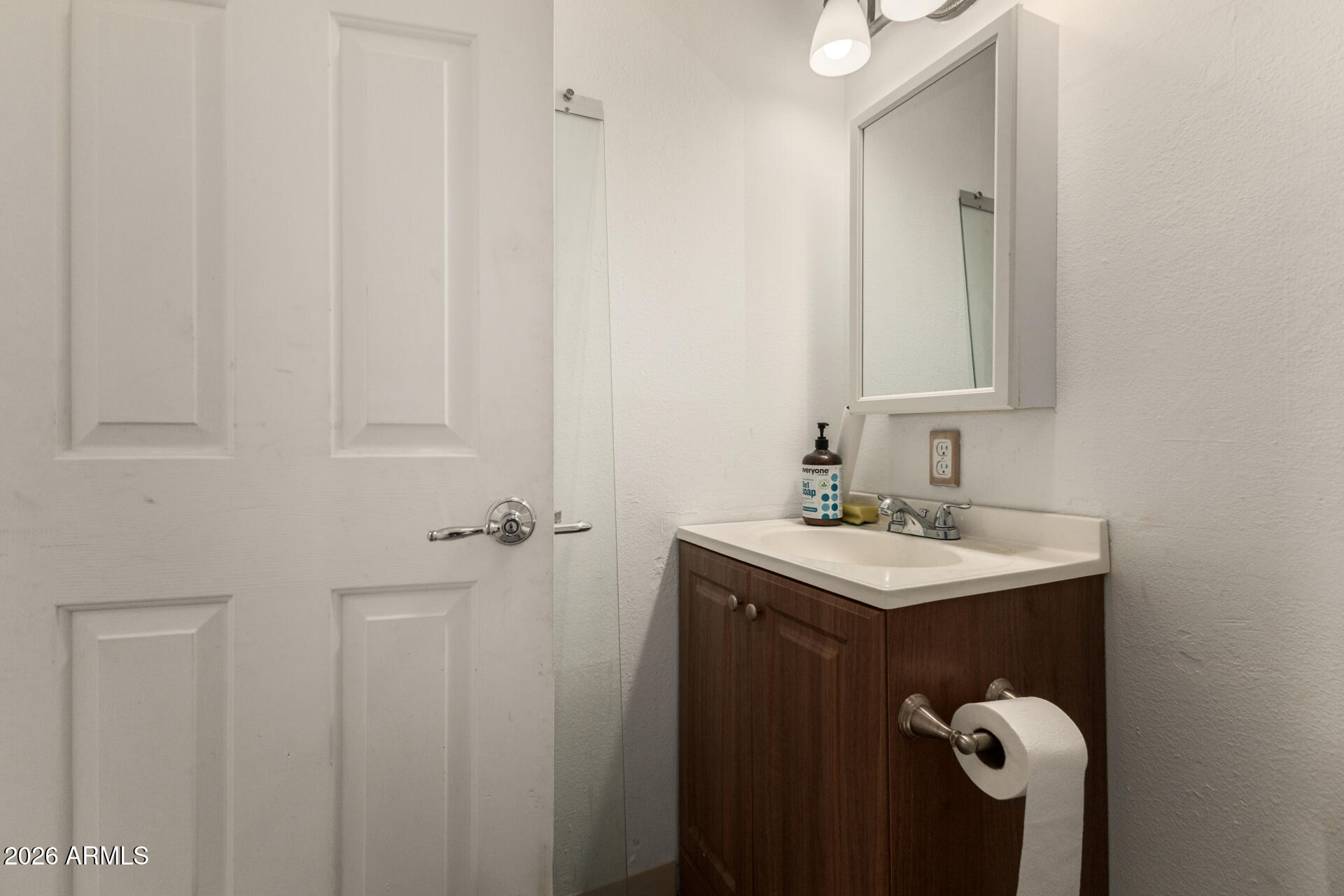 463 South Daley Mesa, AZ 85204 - Photo 21 of 28 a bathroom with a sink a light fixture and a mirror