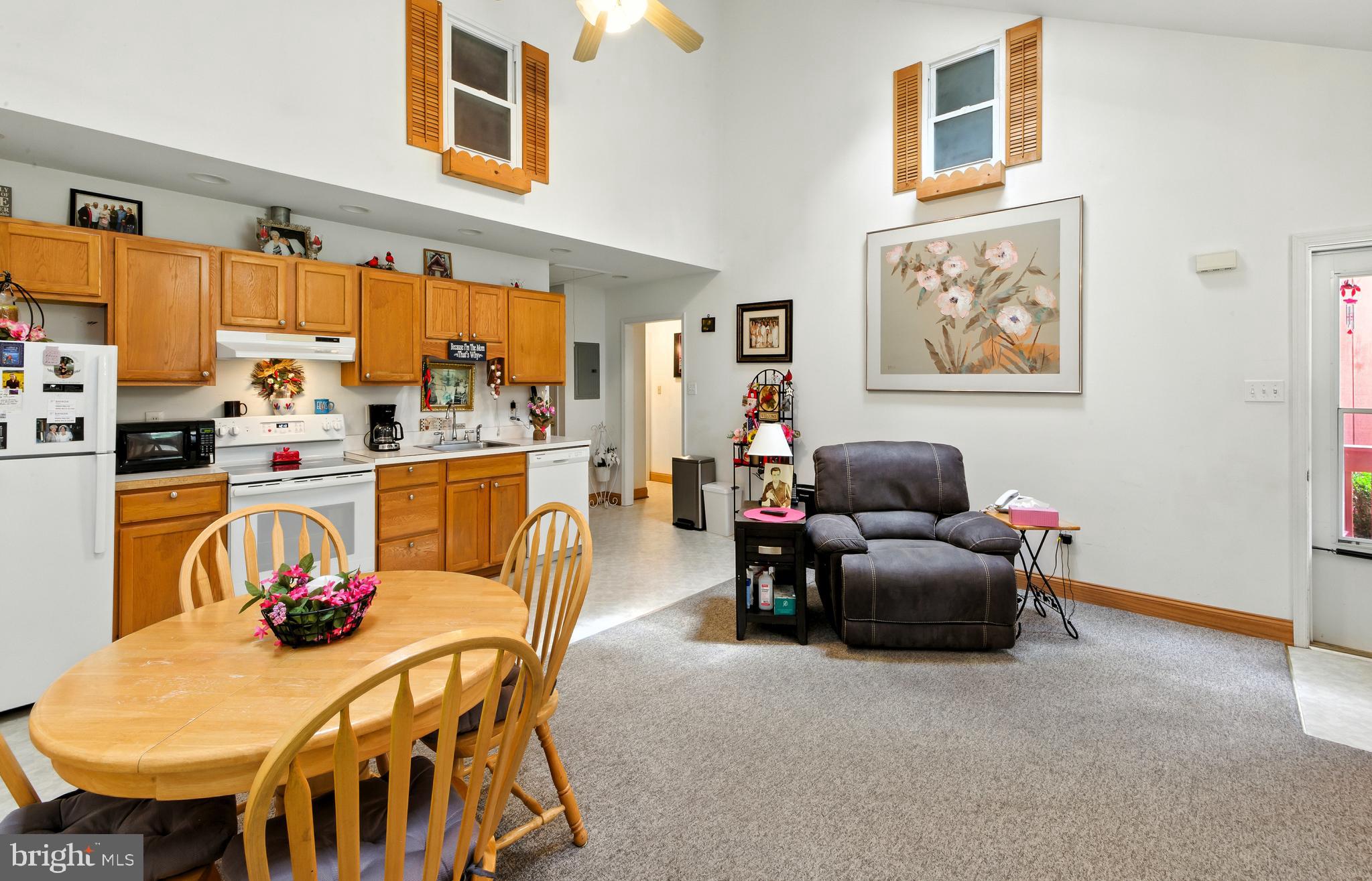112 Hammonton Buena, NJ 08310 - Photo 14 of 34 a living room with stainless steel appliances furniture a dining table and chairs
