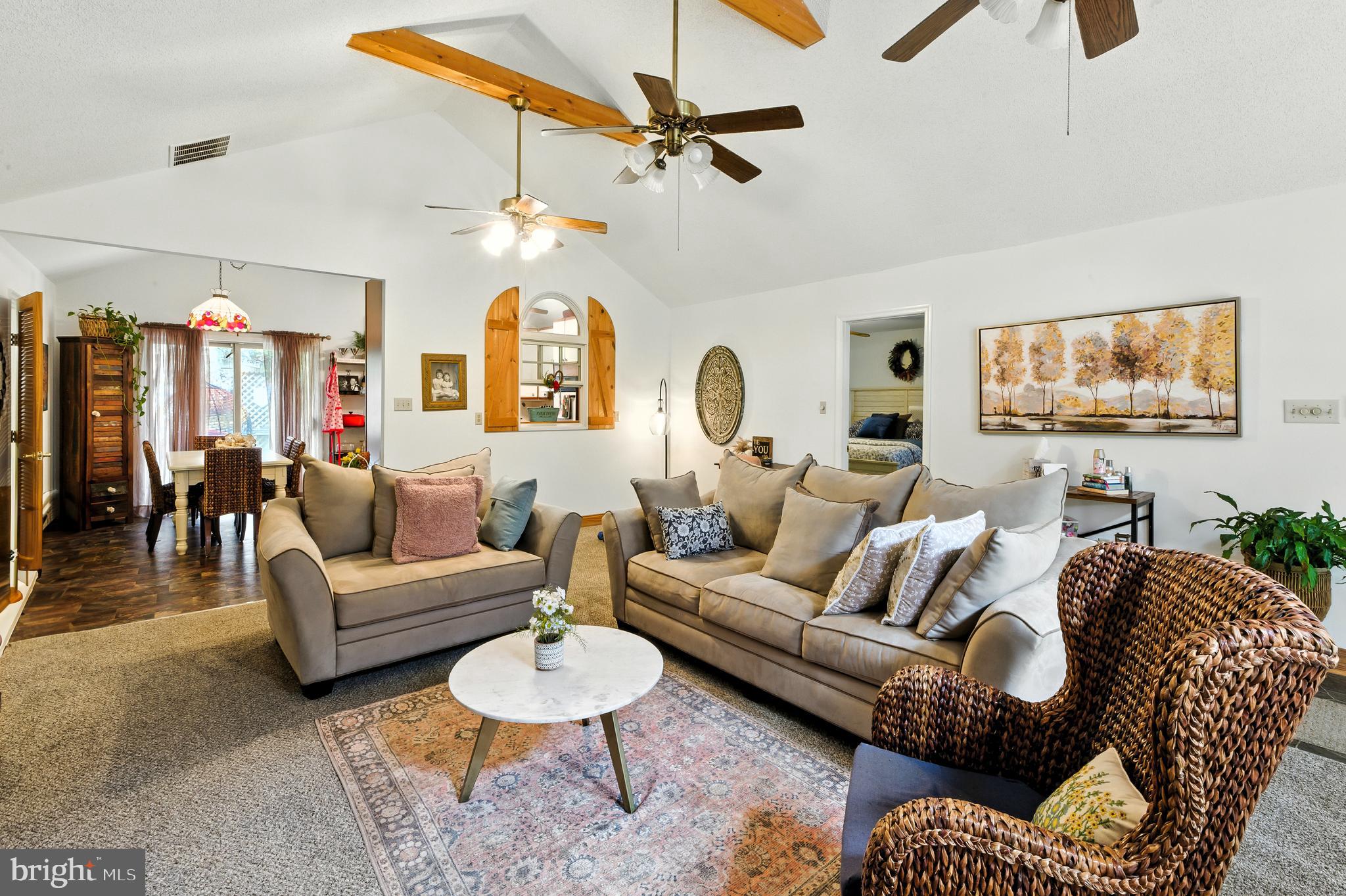 112 Hammonton Buena, NJ 08310 - Photo 17 of 34 a living room with furniture a ceiling fan and a rug