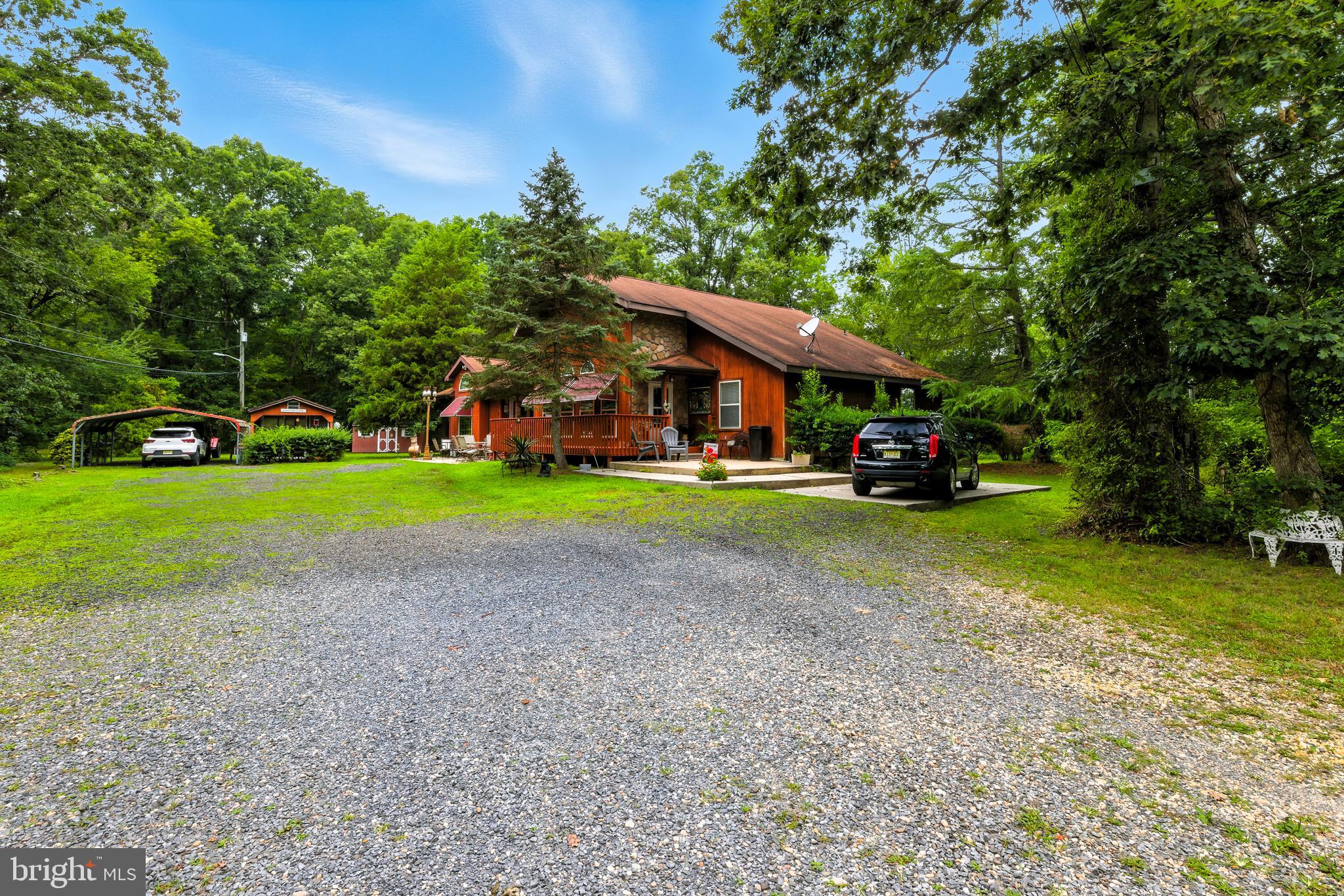 112 Hammonton Buena, NJ 08310 - Photo 2 of 34 a view of outdoor space with garden and trees