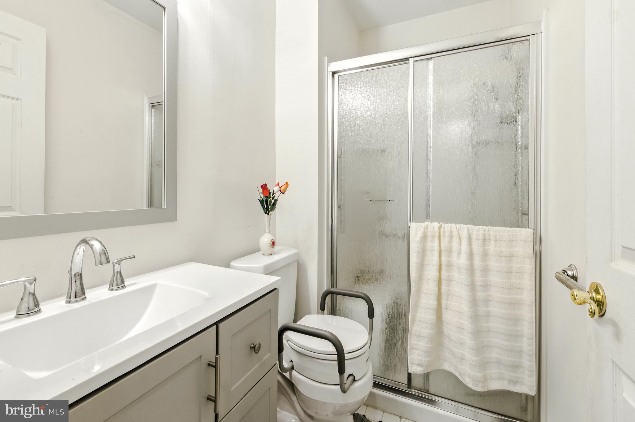 112 Hammonton Buena, NJ 08310 - Photo 29 of 34 a bathroom with a sink and a mirror