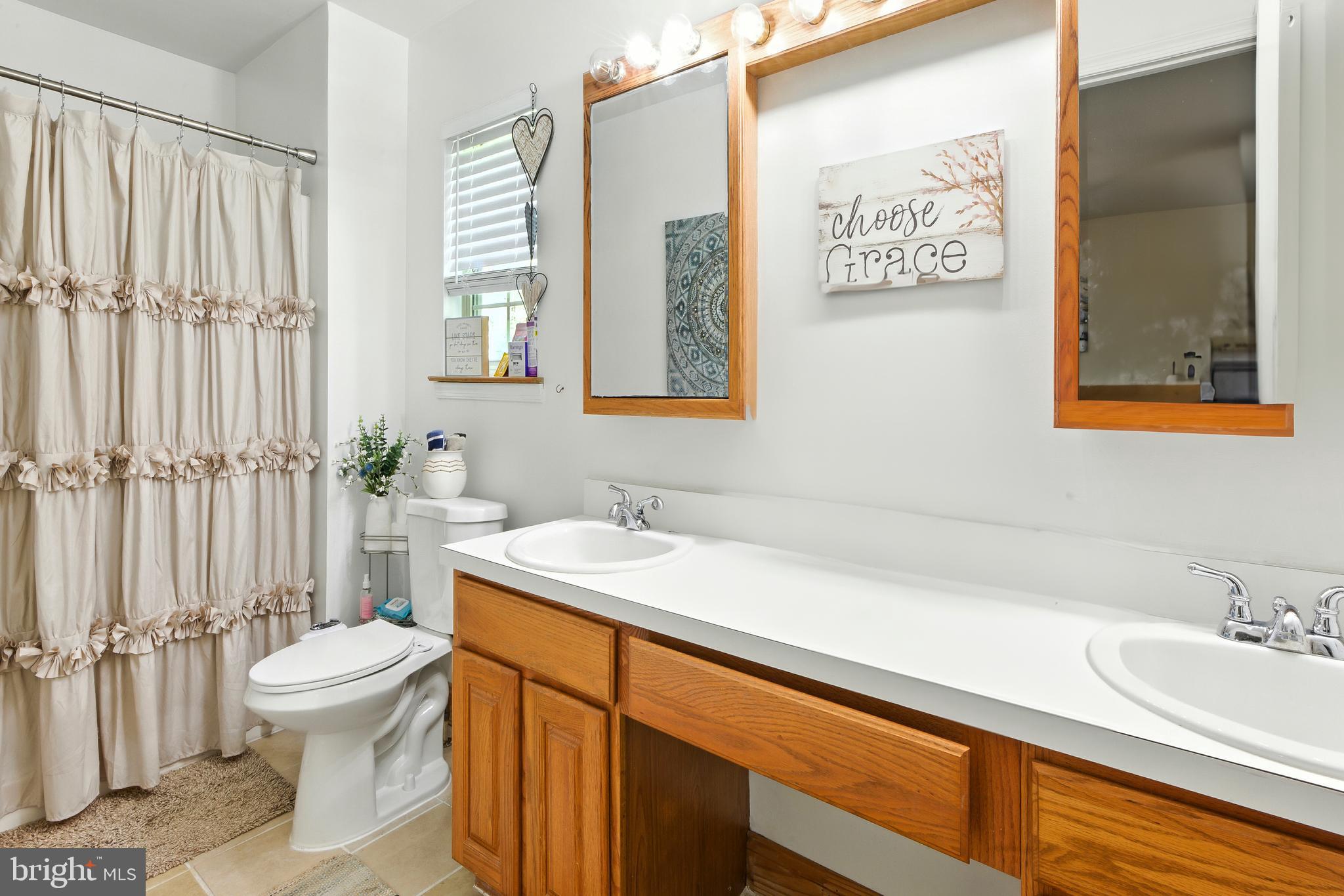 112 Hammonton Buena, NJ 08310 - Photo 31 of 34 a bathroom with a sink a toilet and shower