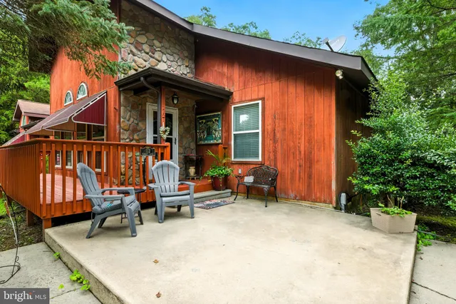 a backyard of a house with seating space