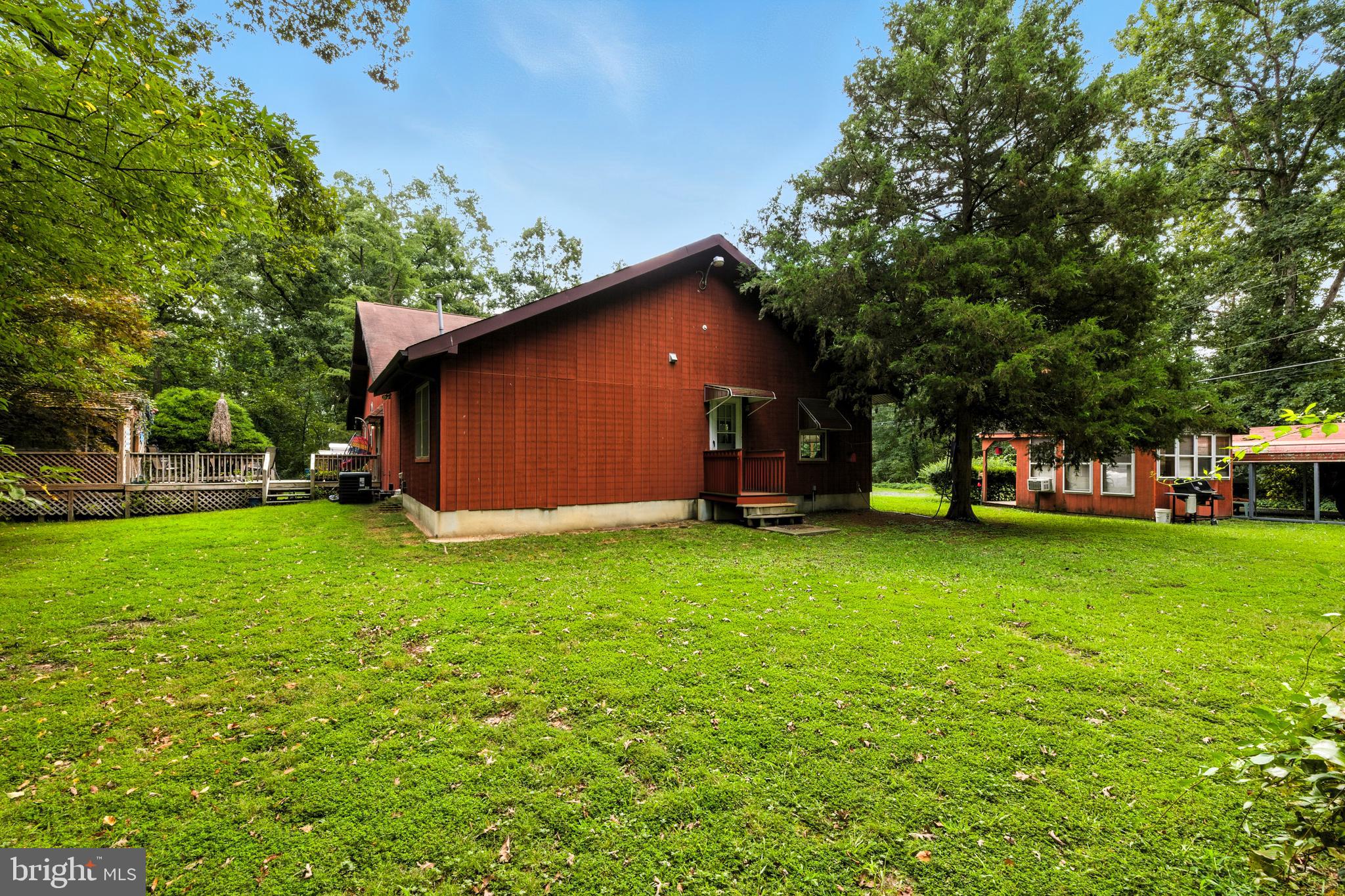 112 Hammonton Buena, NJ 08310 - Photo 6 of 34 a view of a backyard with a garden
