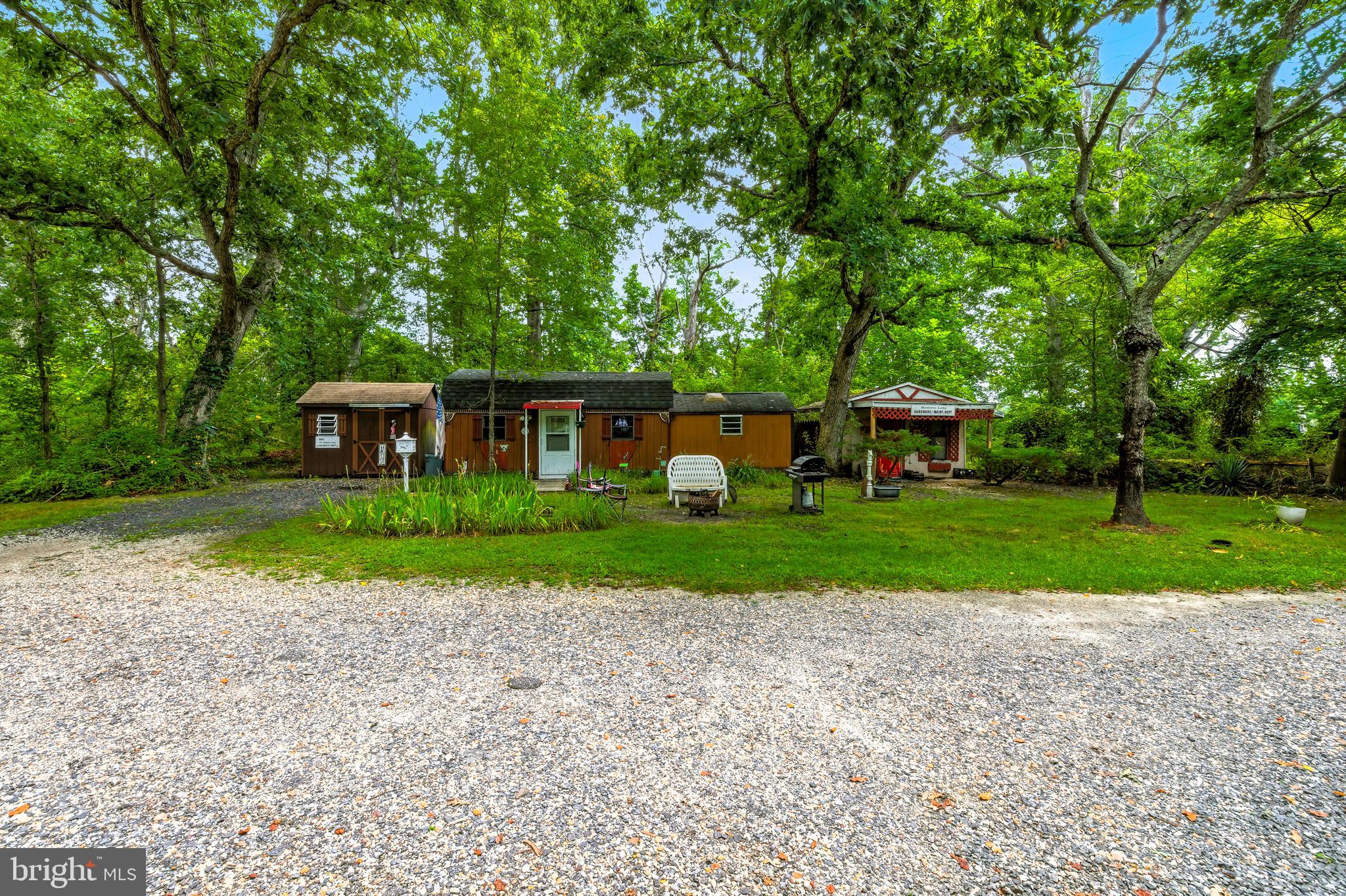 112 Hammonton Buena, NJ 08310 - Photo 8 of 34 a front view of a house with a yard and garage