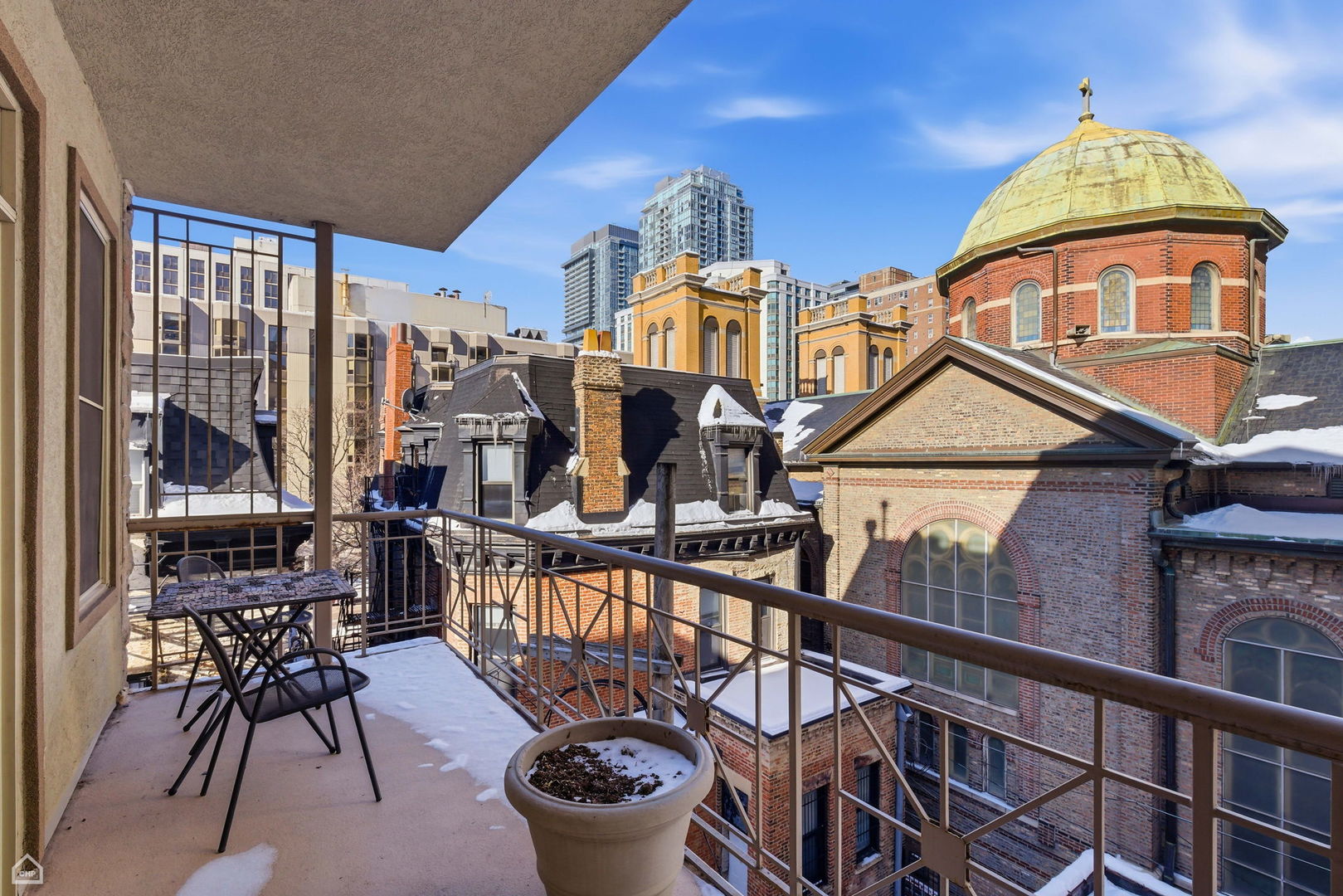 120 West Oak Street, Unit 4D Chicago, IL 60610 - Photo 14 of 18 a view of a balcony with chairs