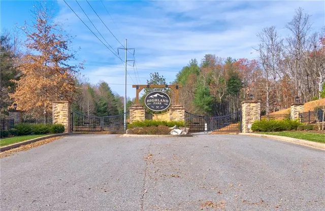 a view of a street with a building in the background