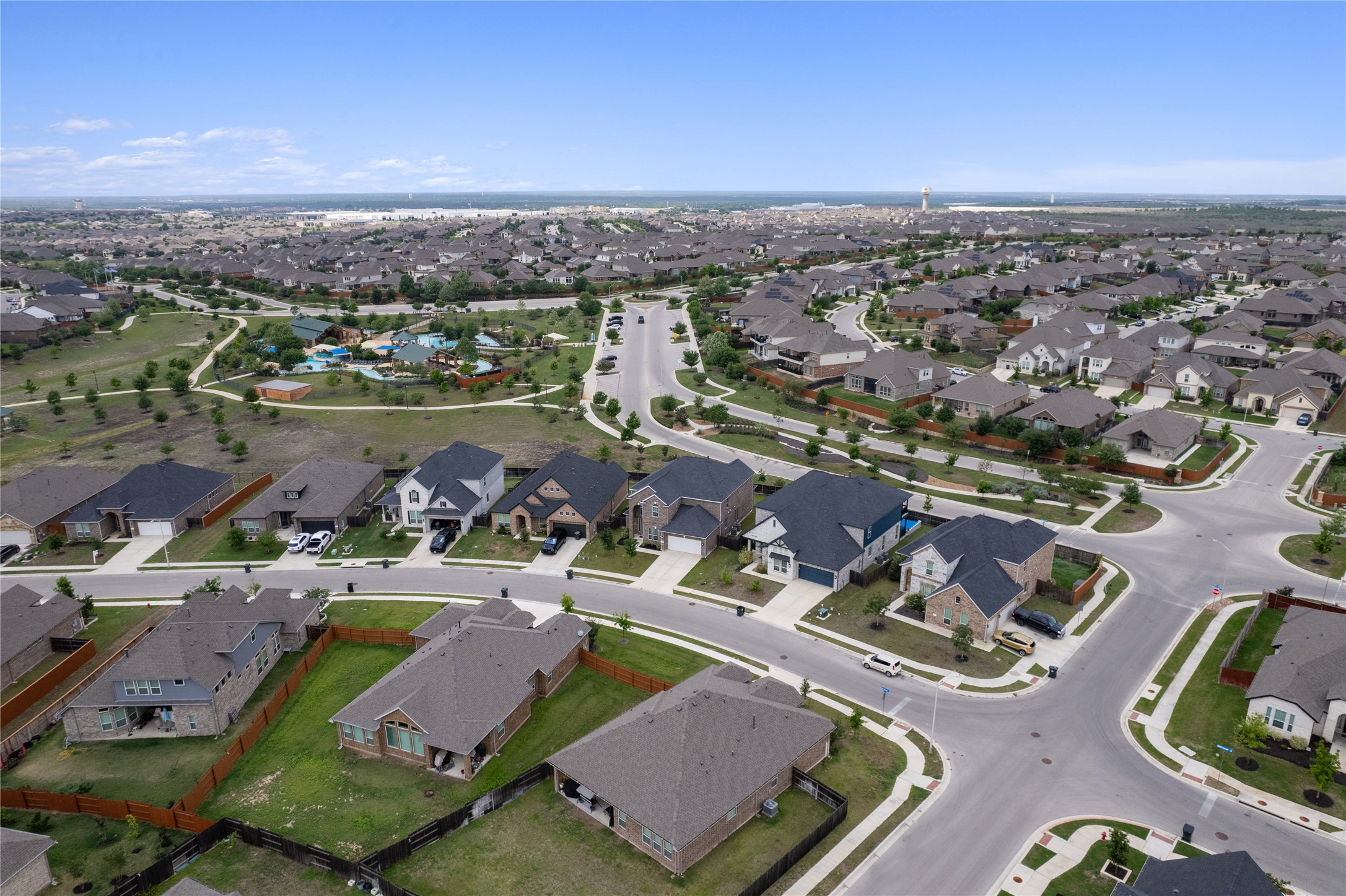 130 Wild Pecan Loop Buda, TX 78610 - Photo 27 of 31 Aerial perspective highlighting a residential development with multiple single-story and two-story homes