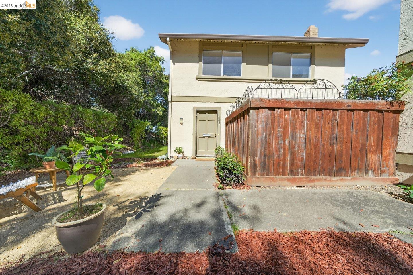 1368 Ridgecrest Road Pinole, CA 94564 - Photo 1 of 1 a front view of a house with a yard